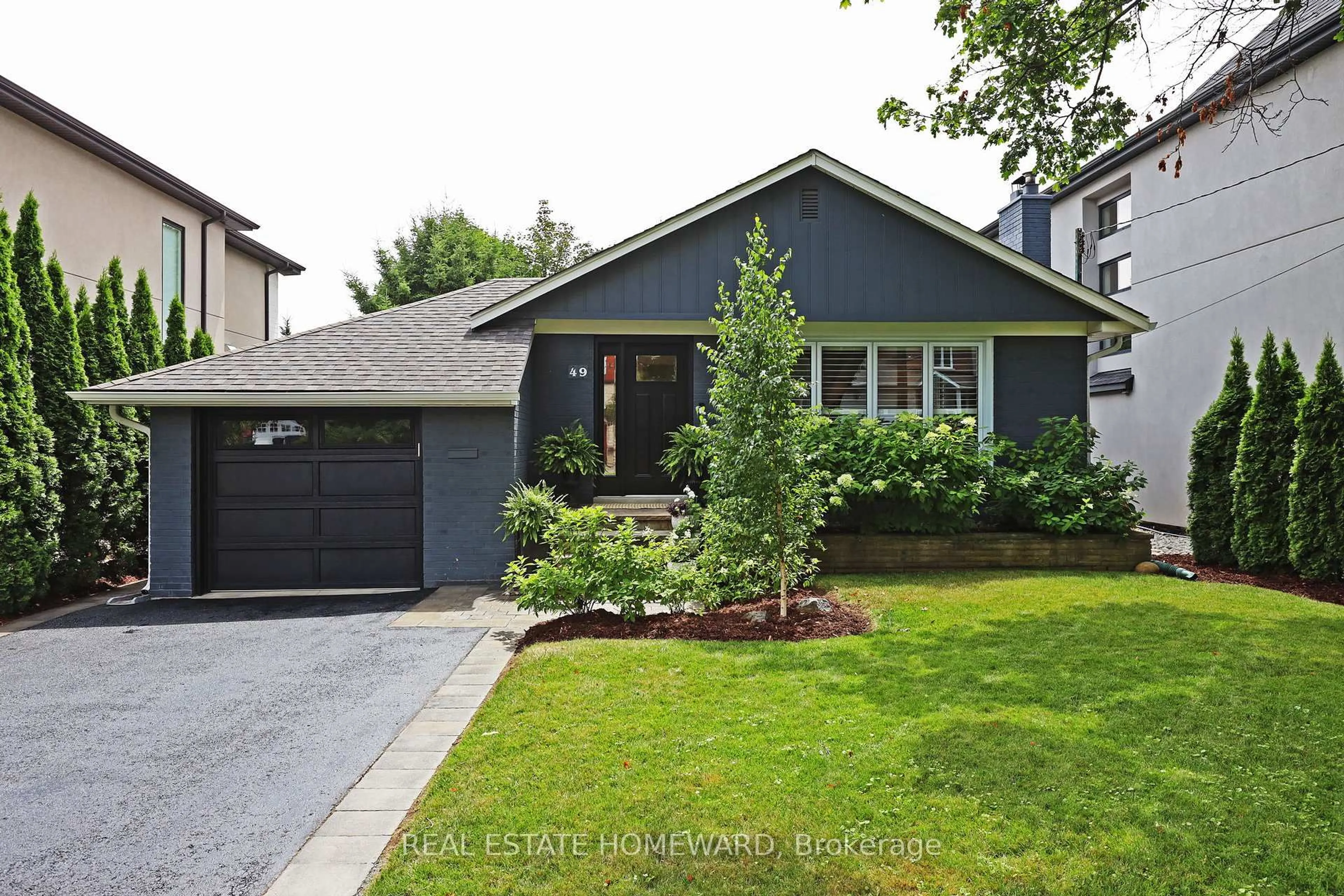 Home with brick exterior material, street for 49 Greenfield Dr, Toronto Ontario M9B 1H2