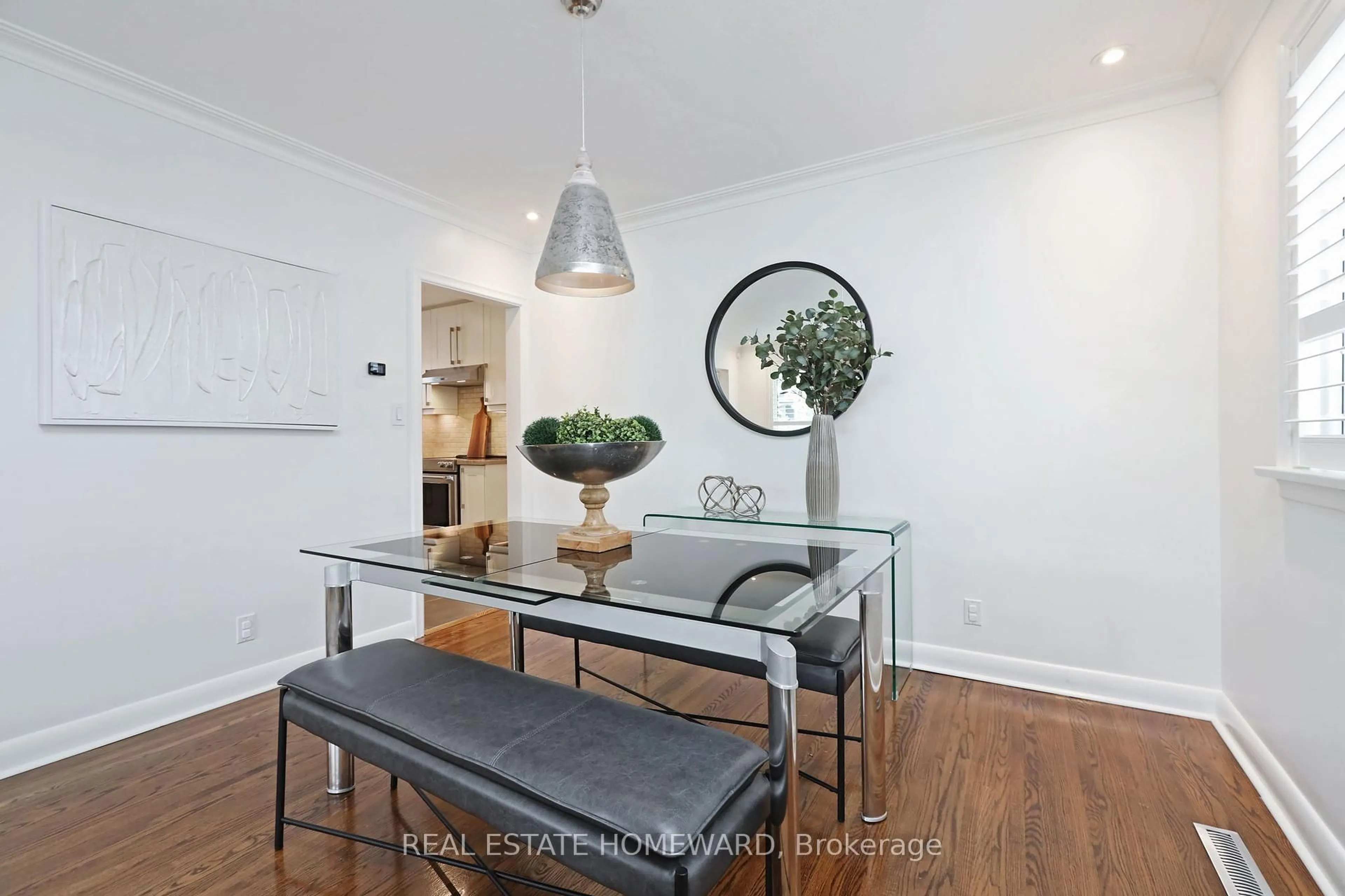Dining room, wood/laminate floor for 49 Greenfield Dr, Toronto Ontario M9B 1H2