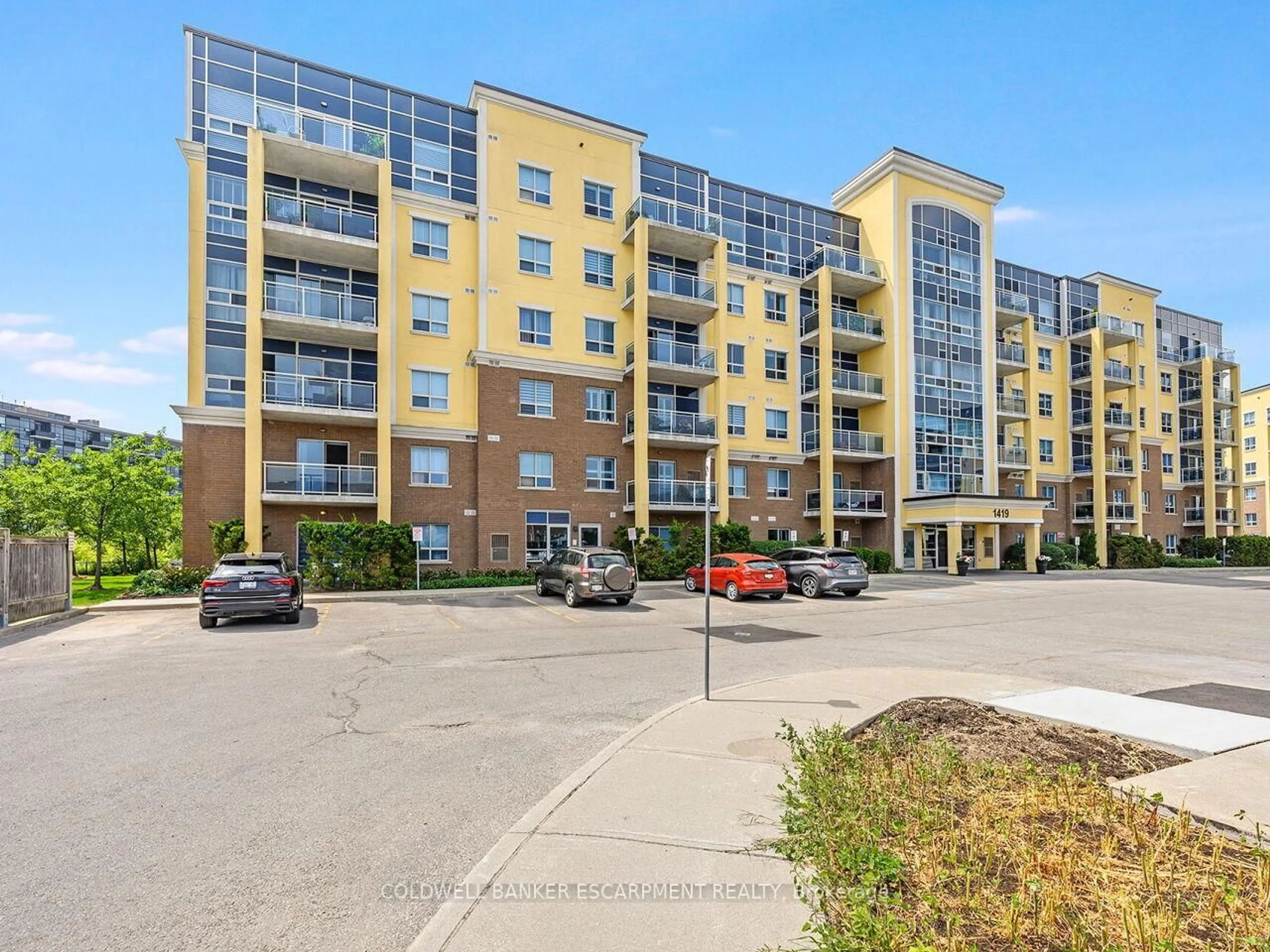 A pic from outside/outdoor area/front of a property/back of a property/a pic from drone, unknown for 1419 Costigan Rd #201, Milton Ontario L9T 2L4