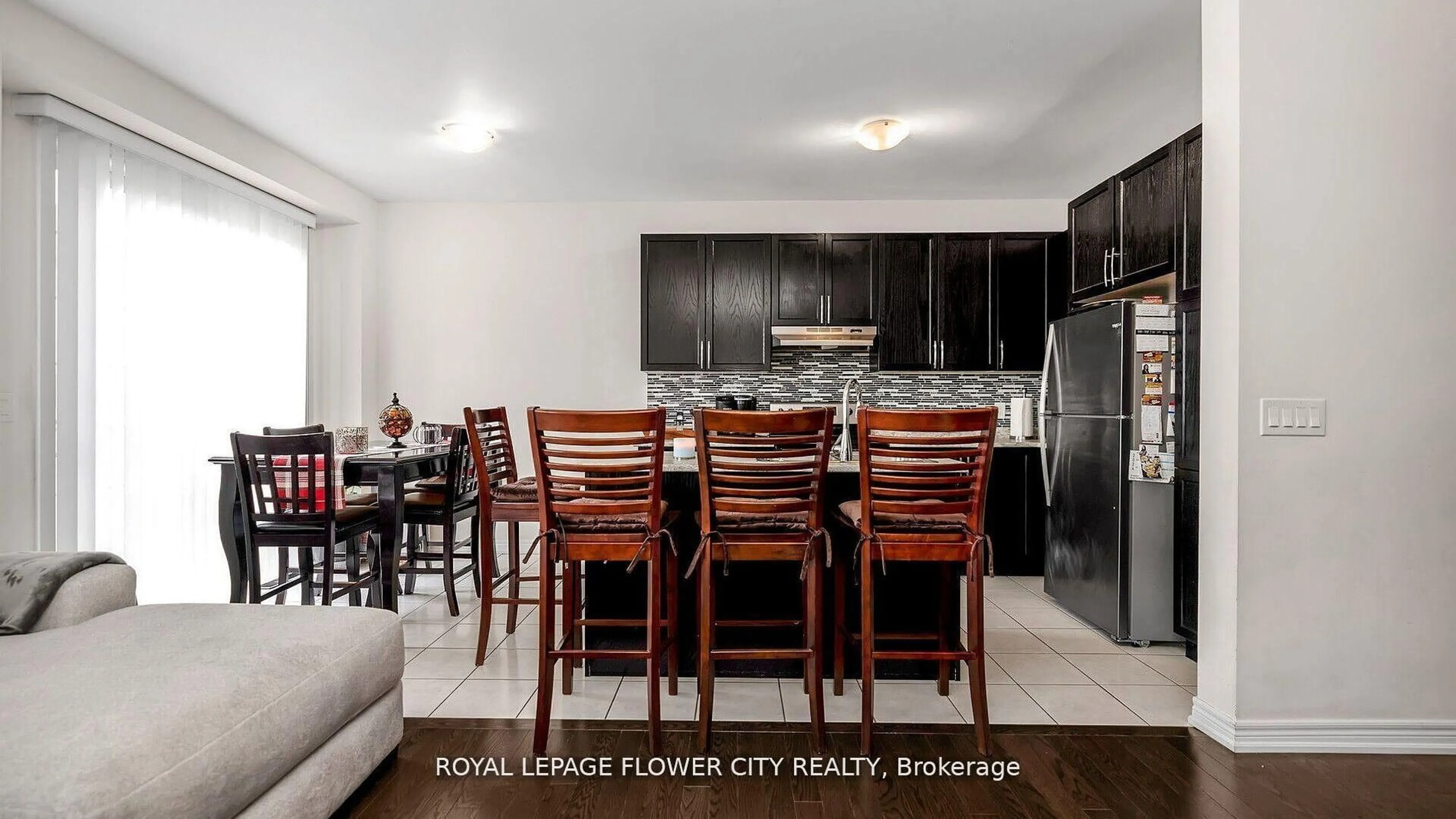 Dining room, wood/laminate floor for 36 Spokanne St, Brampton Ontario L6R 4A2