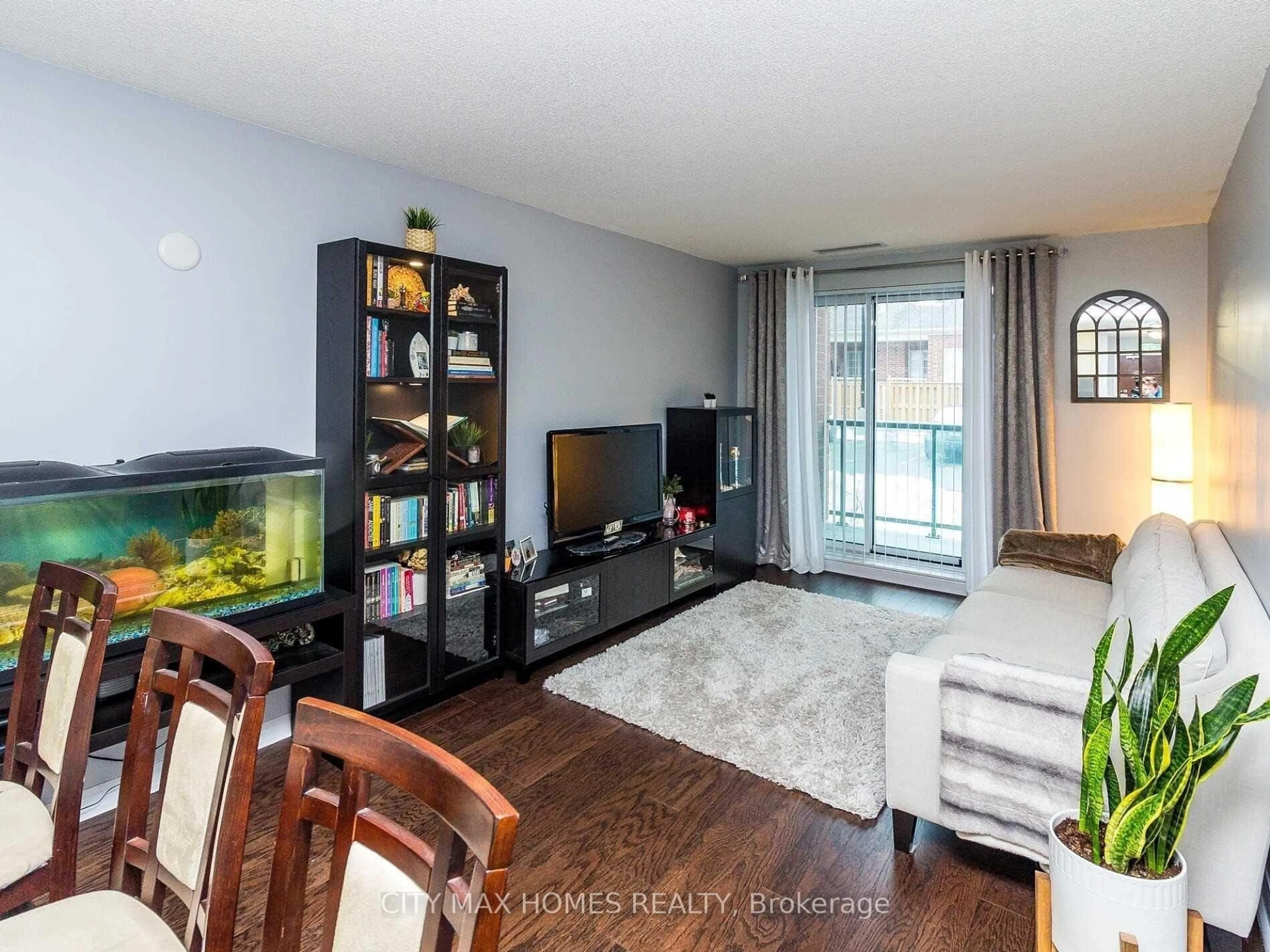 Living room with furniture, wood/laminate floor for 50 Via Rosedale Way #116, Brampton Ontario L6R 3Z7