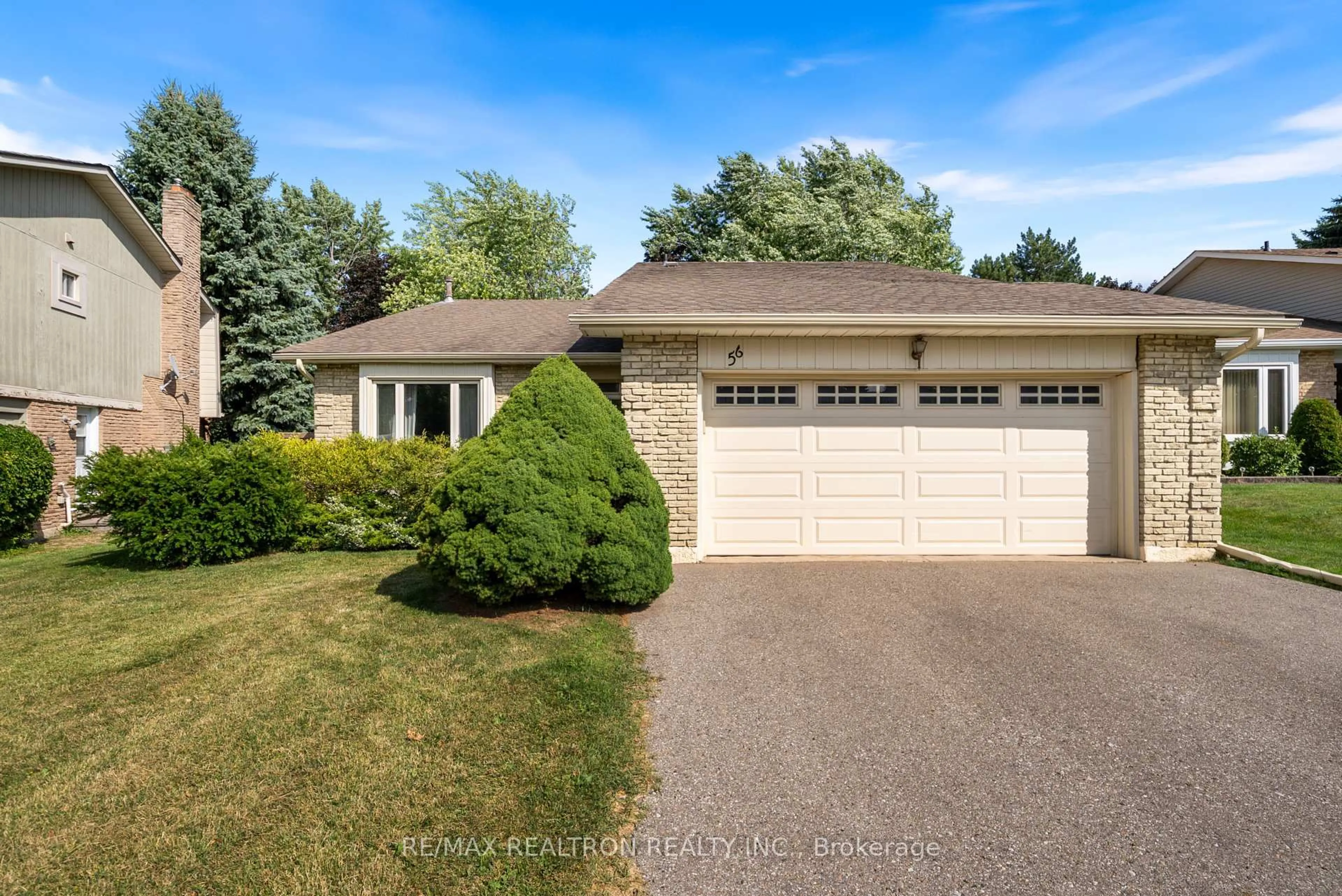 Home with vinyl exterior material, street for 56 Mansfield St, Brampton Ontario L6S 2Y5