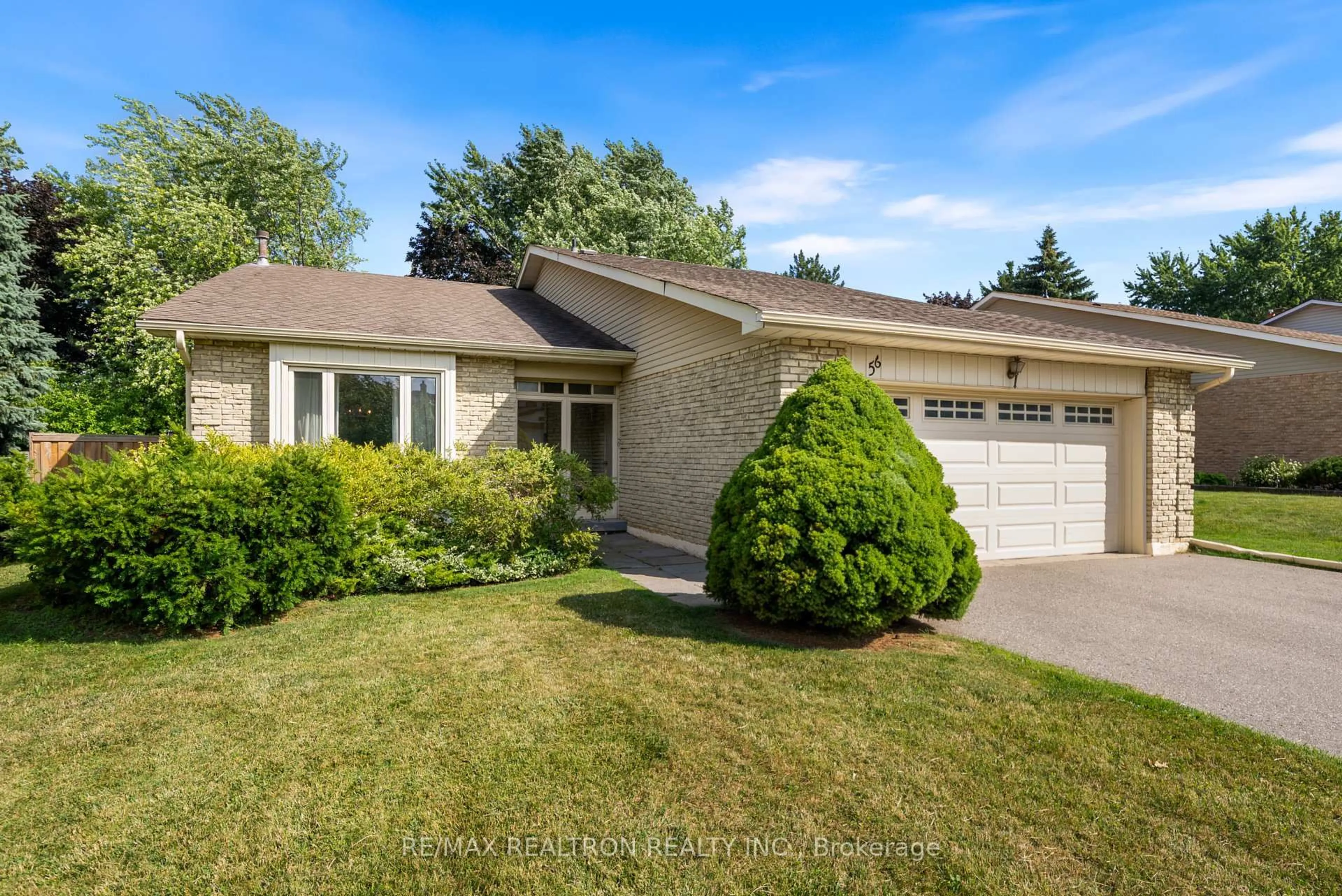 Home with vinyl exterior material, street for 56 Mansfield St, Brampton Ontario L6S 2Y5