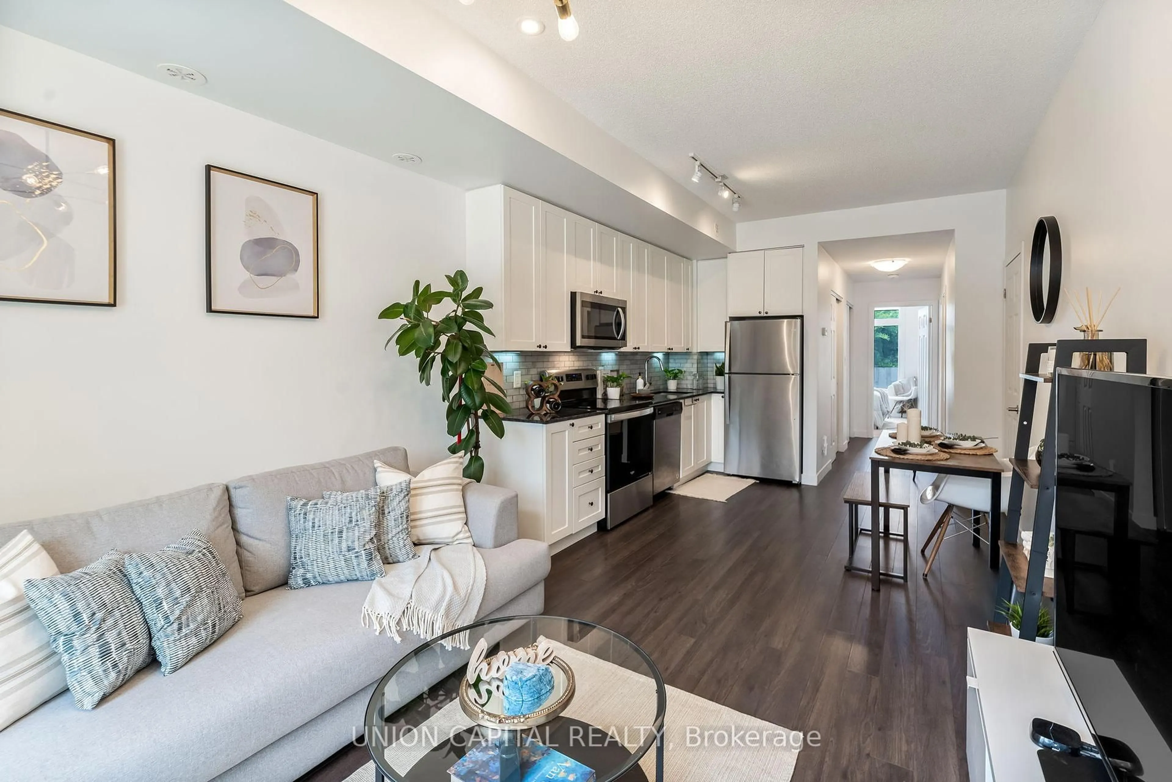 Open concept kitchen, wood/laminate floor for 6 Bicknell Ave #1, Toronto Ontario M6M 0B4