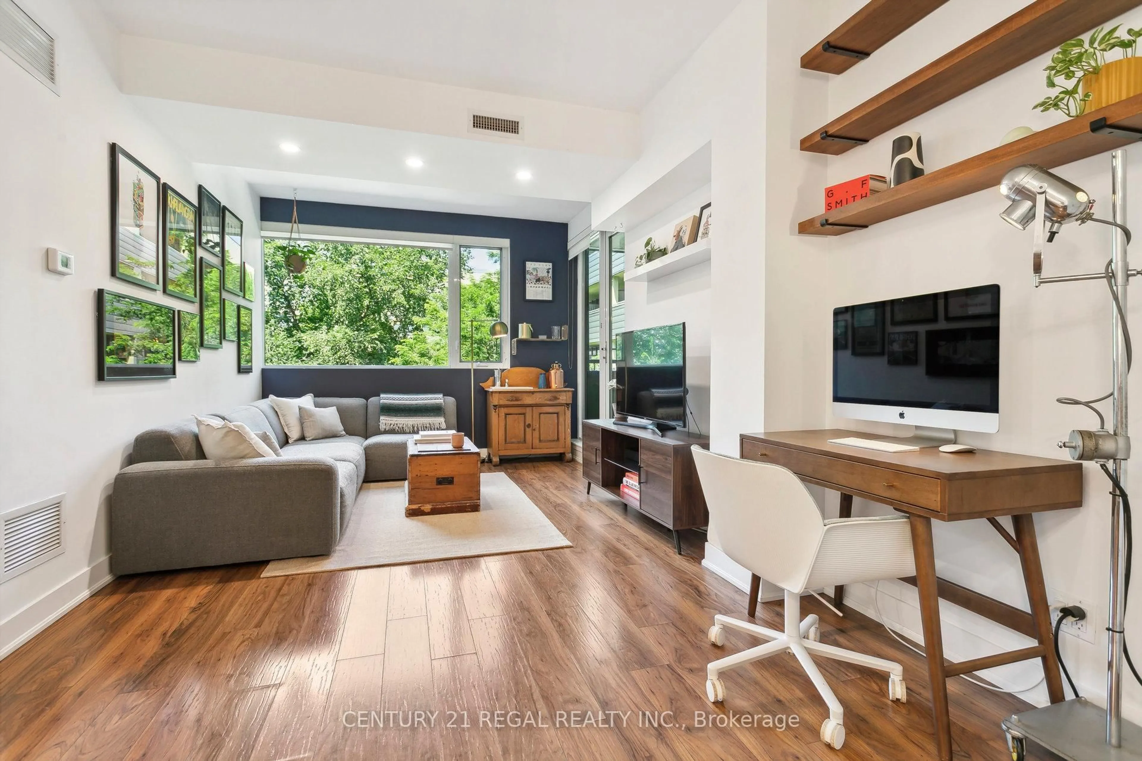 Living room with furniture, wood/laminate floor for 25 Ritchie Ave #312, Toronto Ontario M6R 2J6