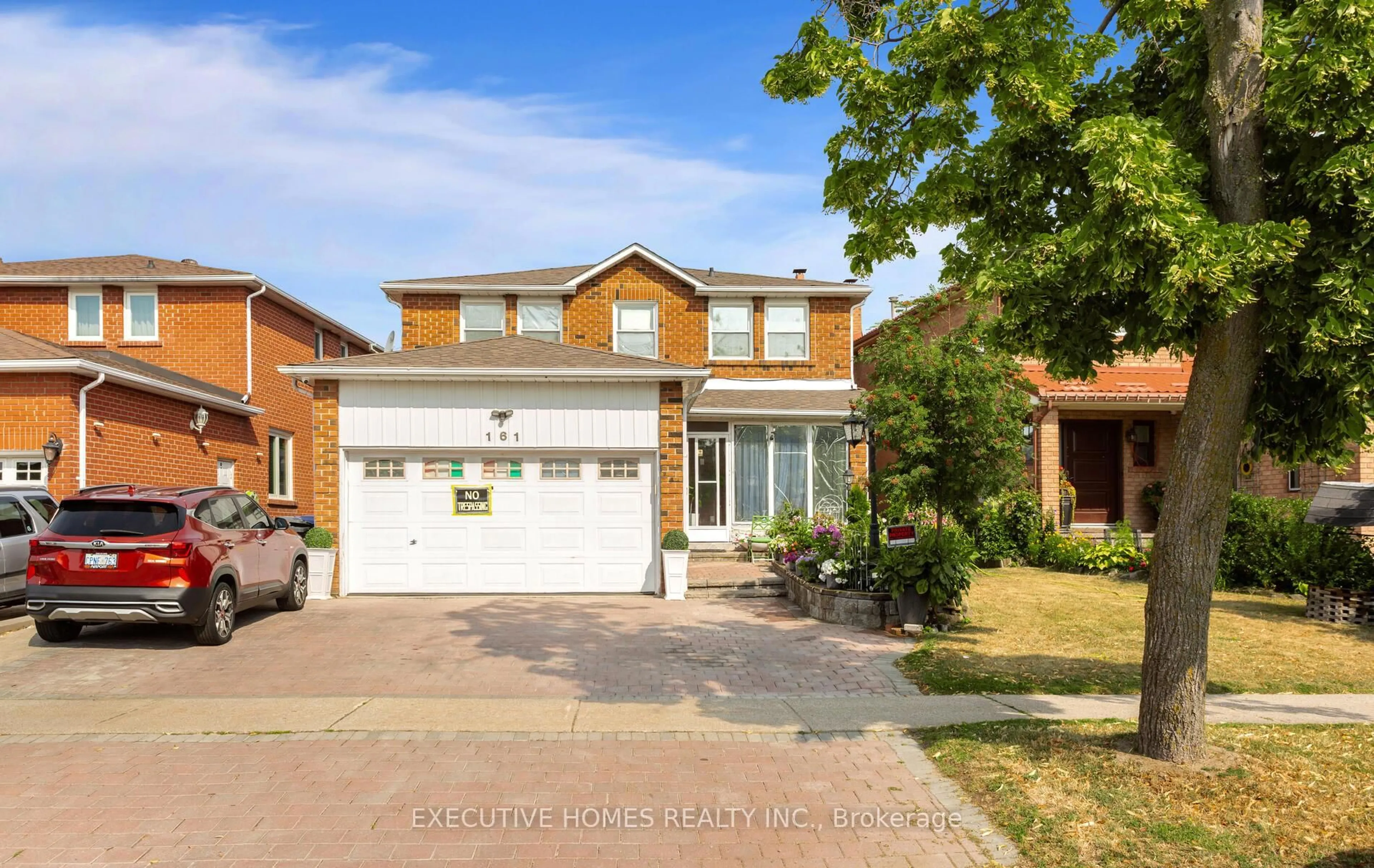Home with brick exterior material, street for 161 Kingsbridge Garden Circ, Mississauga Ontario L5R 1T6