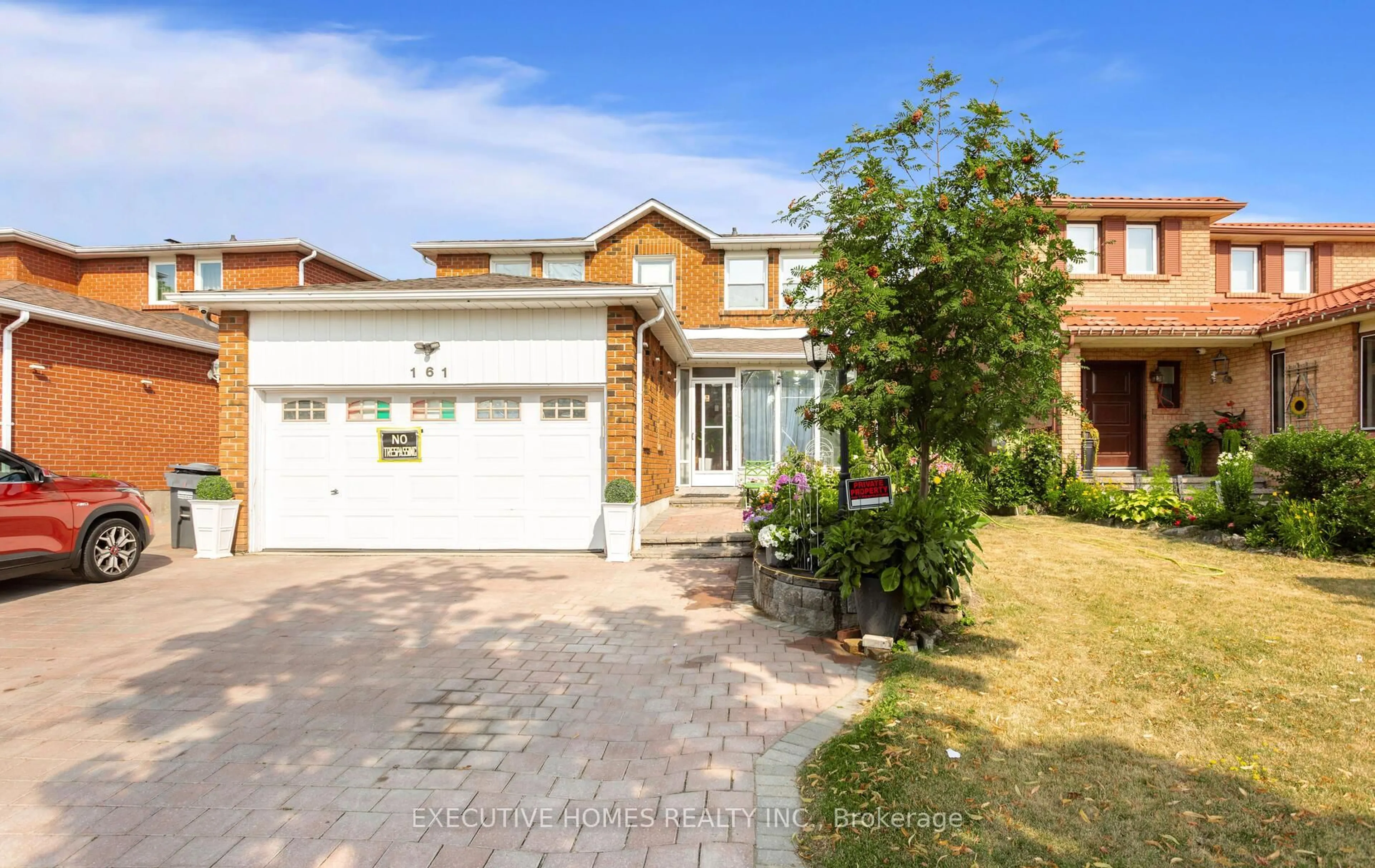 Home with brick exterior material, street for 161 Kingsbridge Garden Circ, Mississauga Ontario L5R 1T6