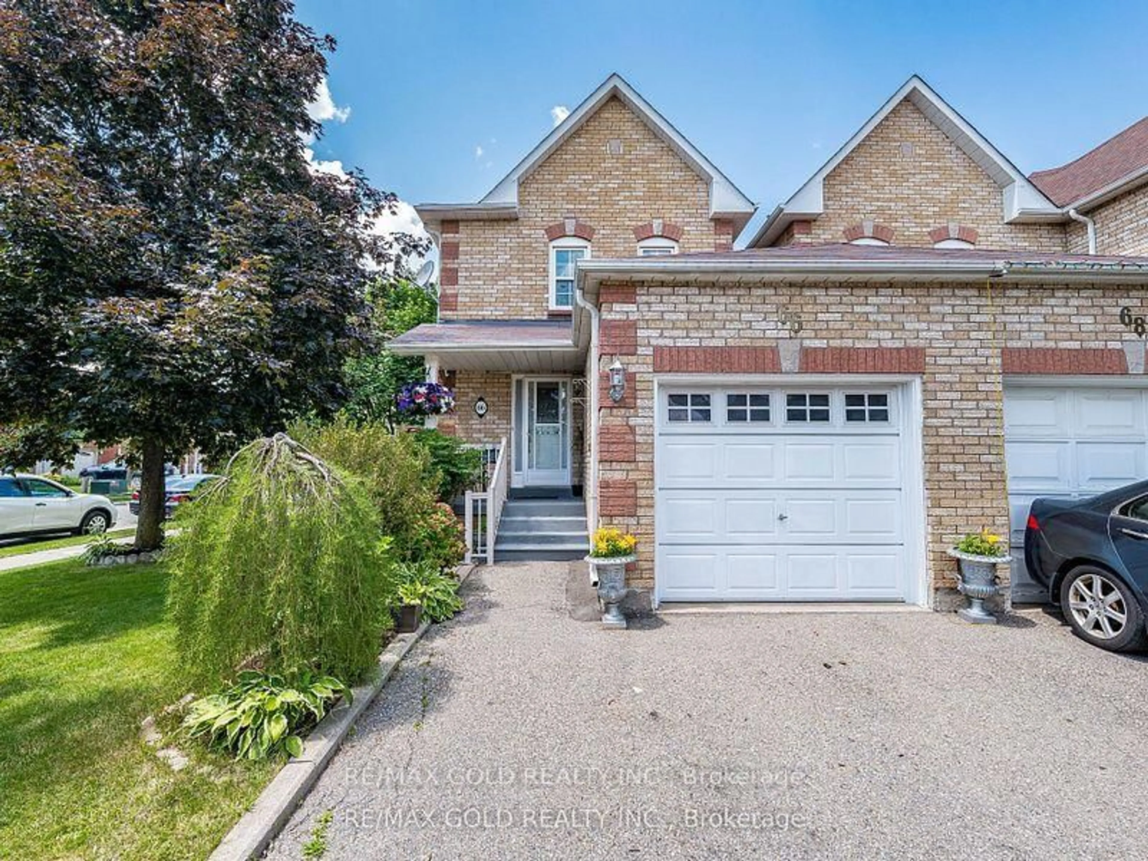 Home with brick exterior material, street for 66 Muirland Cres, Brampton Ontario L6X 4P3