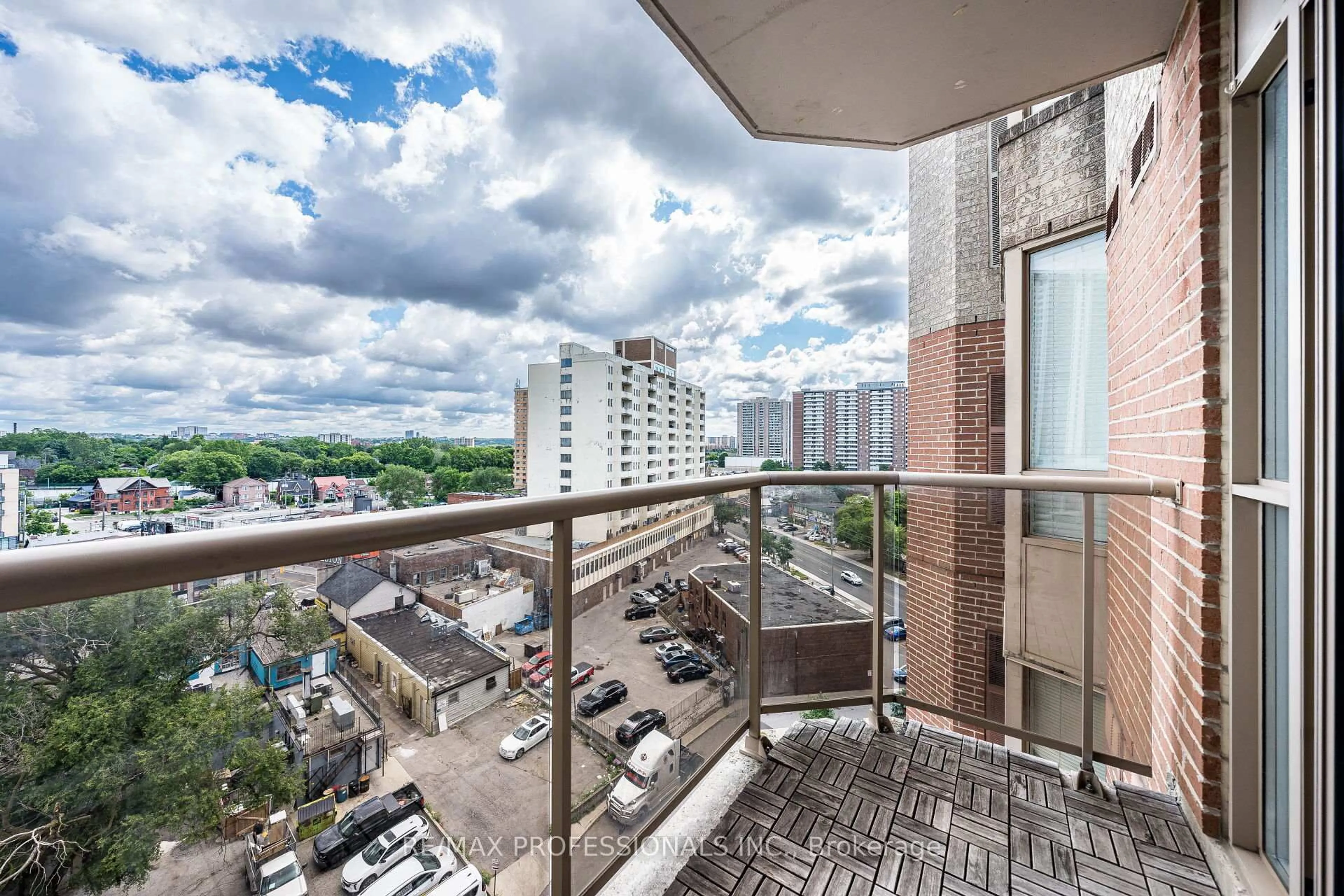Balcony in the apartment, city buildings view from balcony for 2088 Lawrence Ave #1007, Toronto Ontario M9N 3Z9
