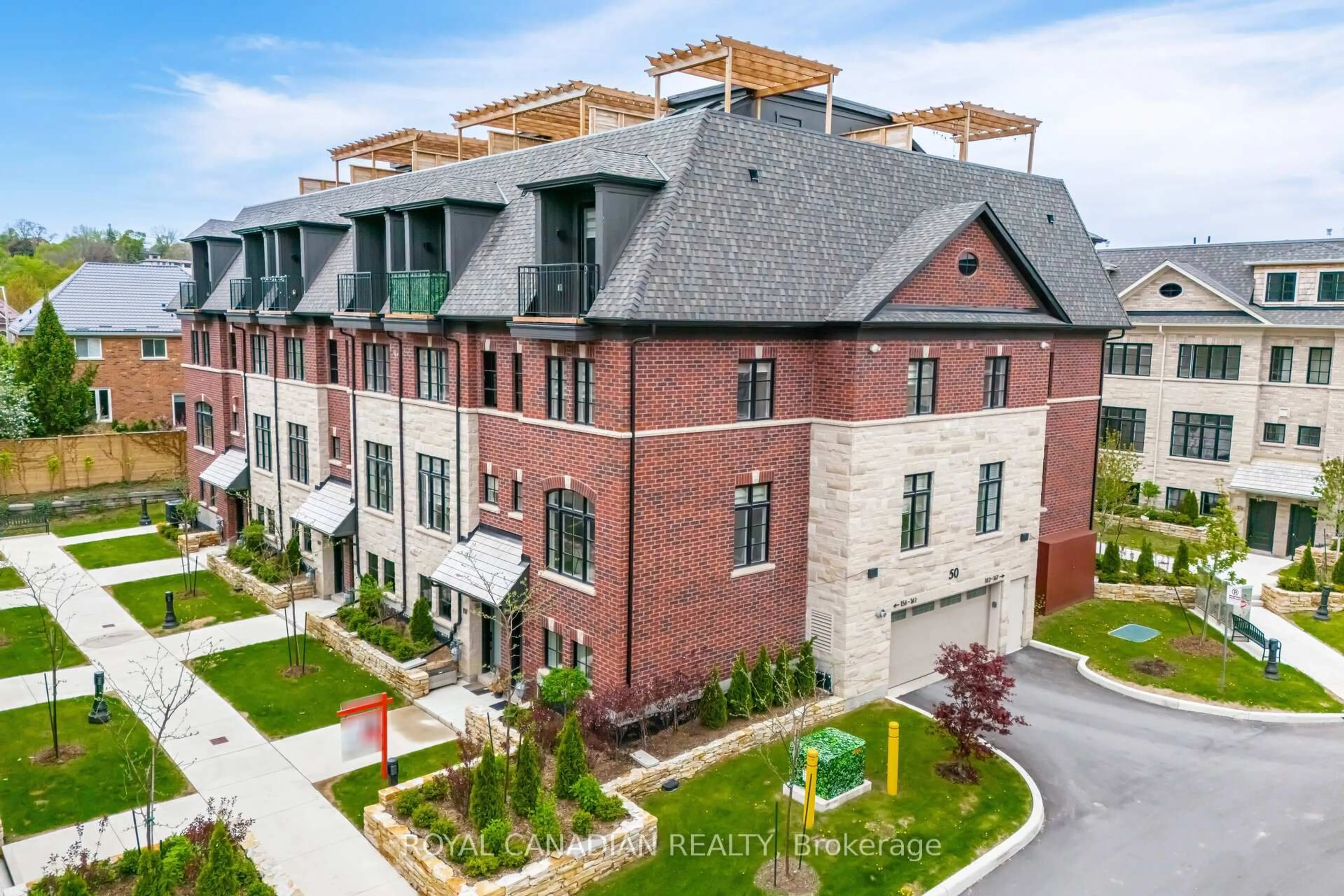 A pic from outside/outdoor area/front of a property/back of a property/a pic from drone, unknown for 50 Lunar Cres #156, Mississauga Ontario L5M 2R4