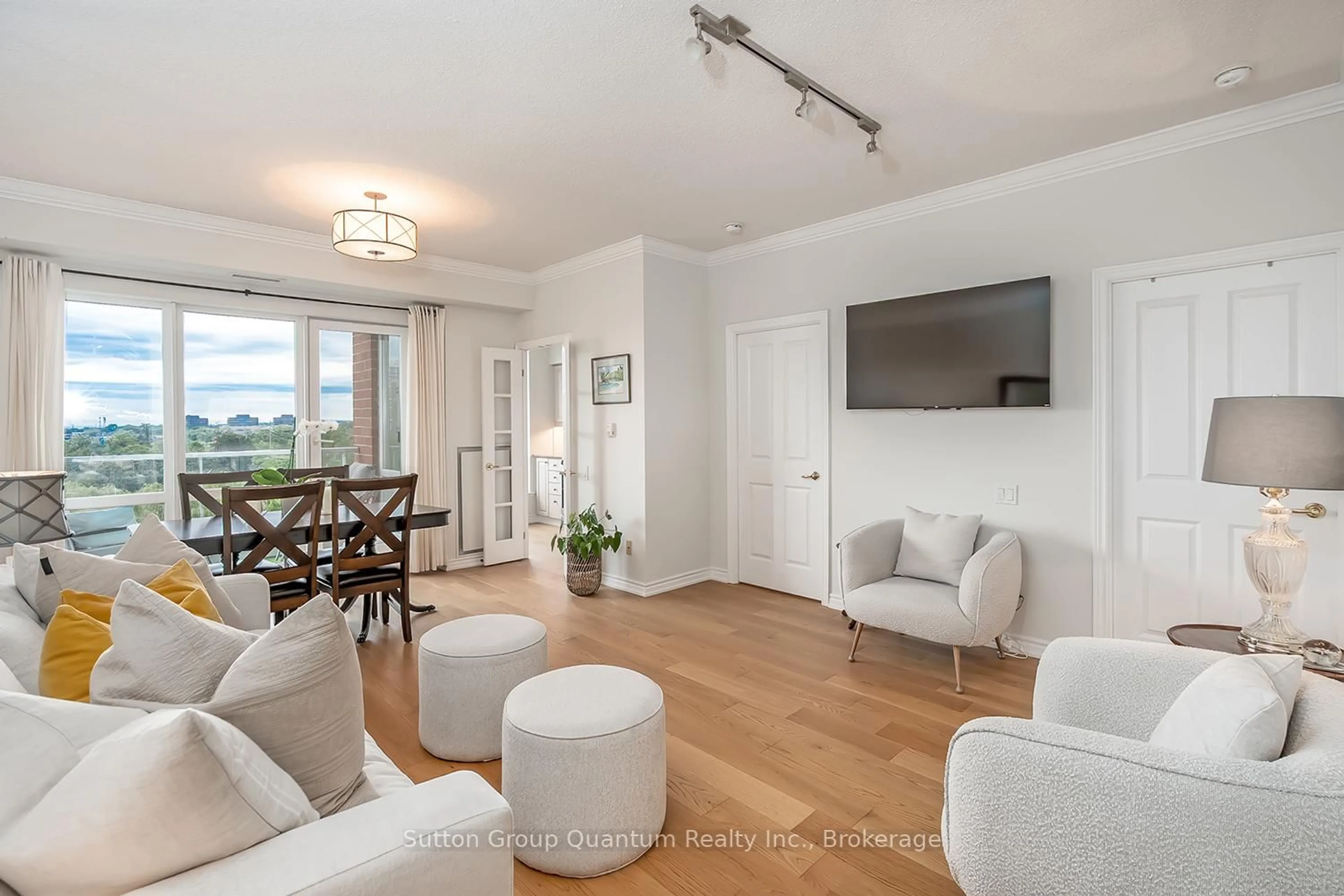 Living room with furniture, wood/laminate floor for 40 Old Mill Rd #602, Oakville Ontario L6J 7W2