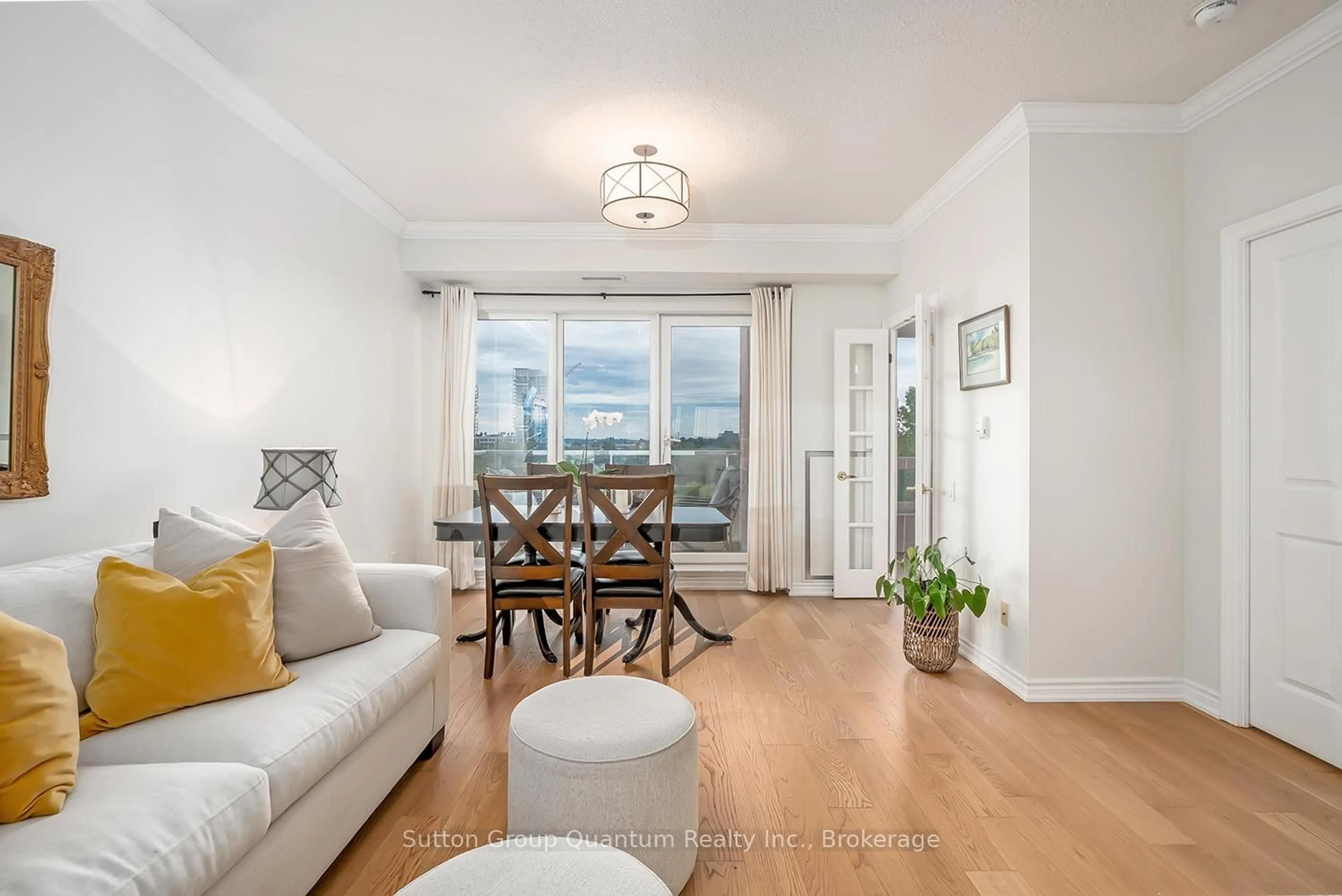 Living room with furniture, wood/laminate floor for 40 Old Mill Rd #602, Oakville Ontario L6J 7W2