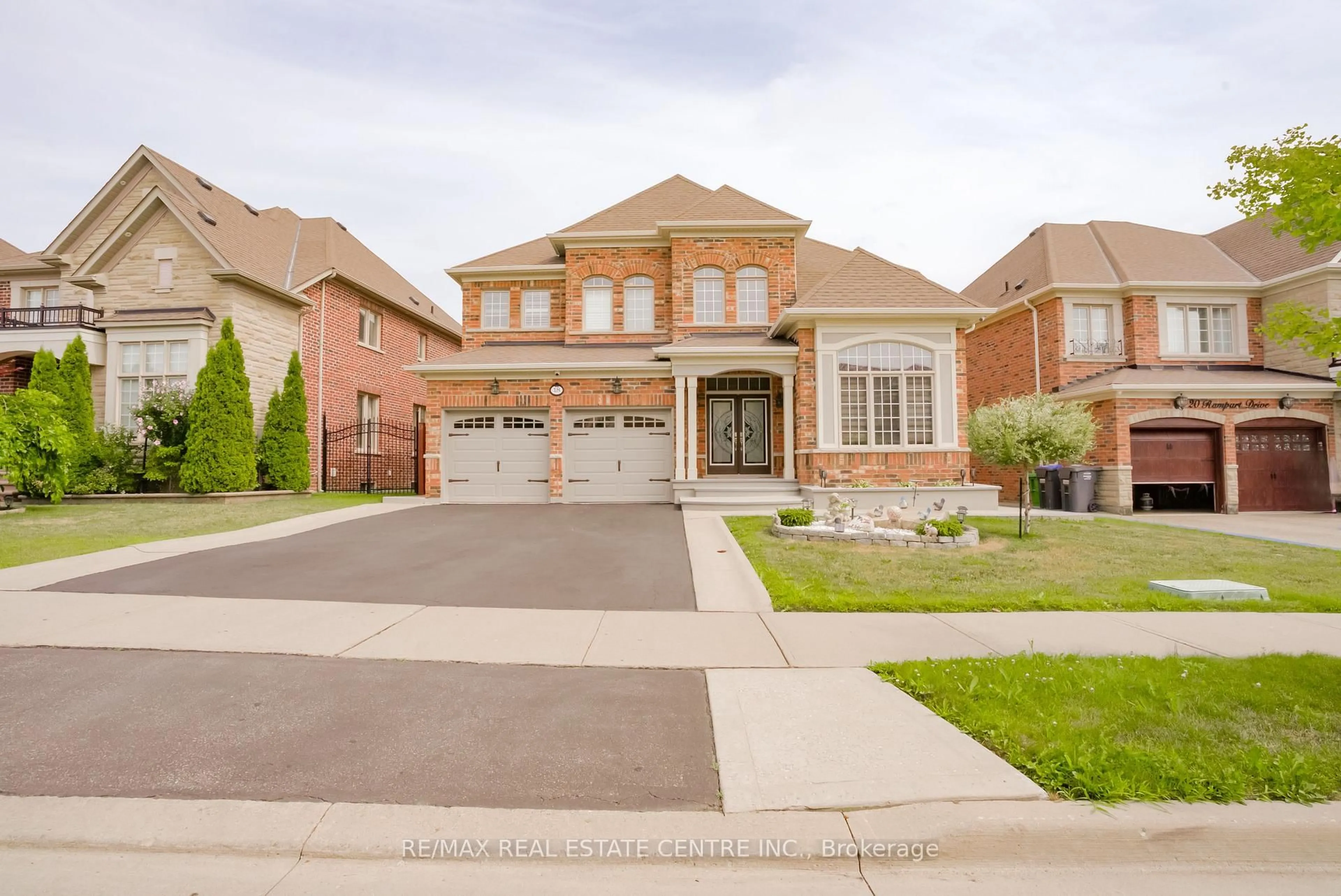 Home with brick exterior material, street for 18 Rampart Dr, Brampton Ontario L6P 2K3
