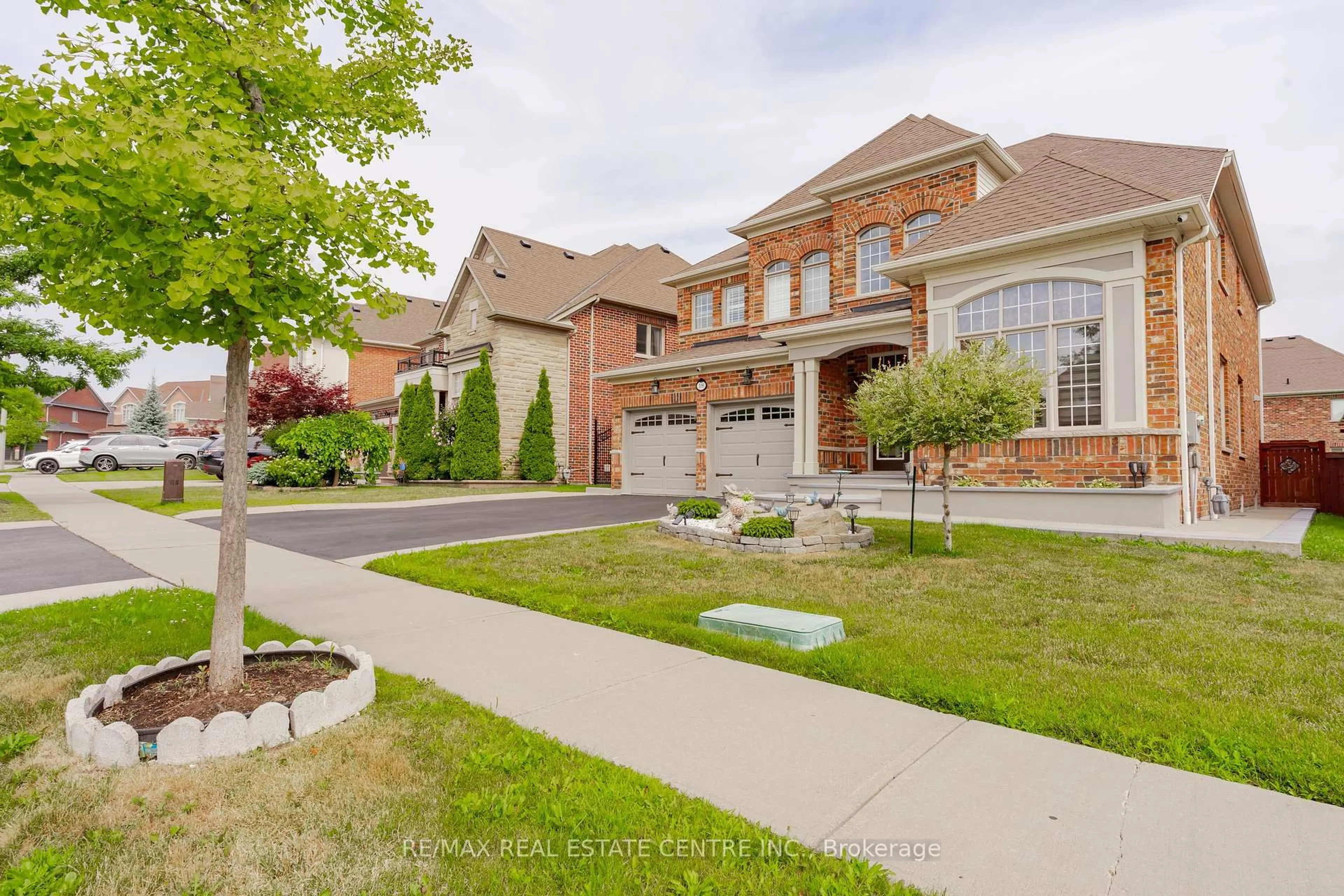 Home with brick exterior material, street for 18 Rampart Dr, Brampton Ontario L6P 2K3