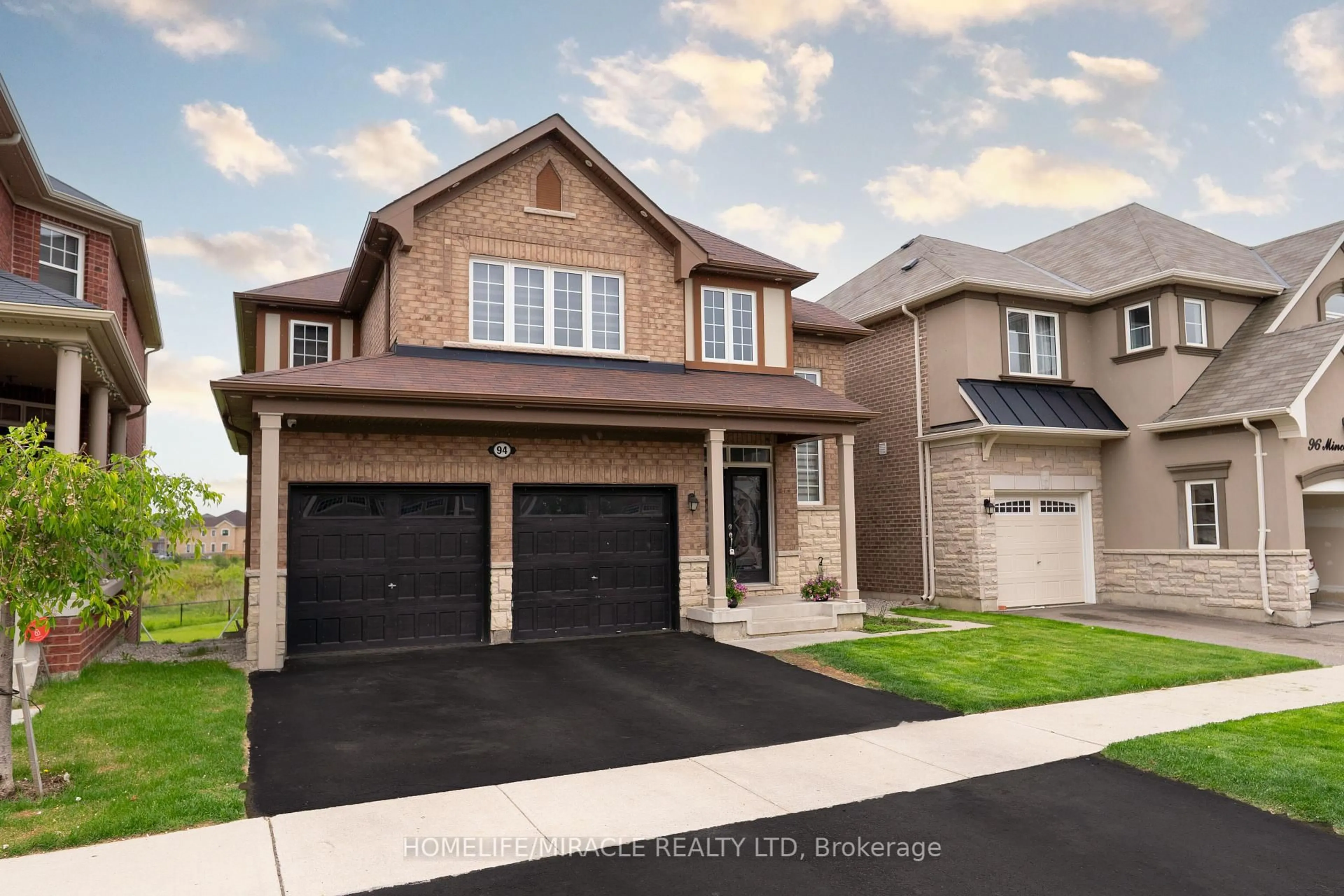 Home with brick exterior material, street for 94 Mincing Tr, Brampton Ontario L7A 4S9