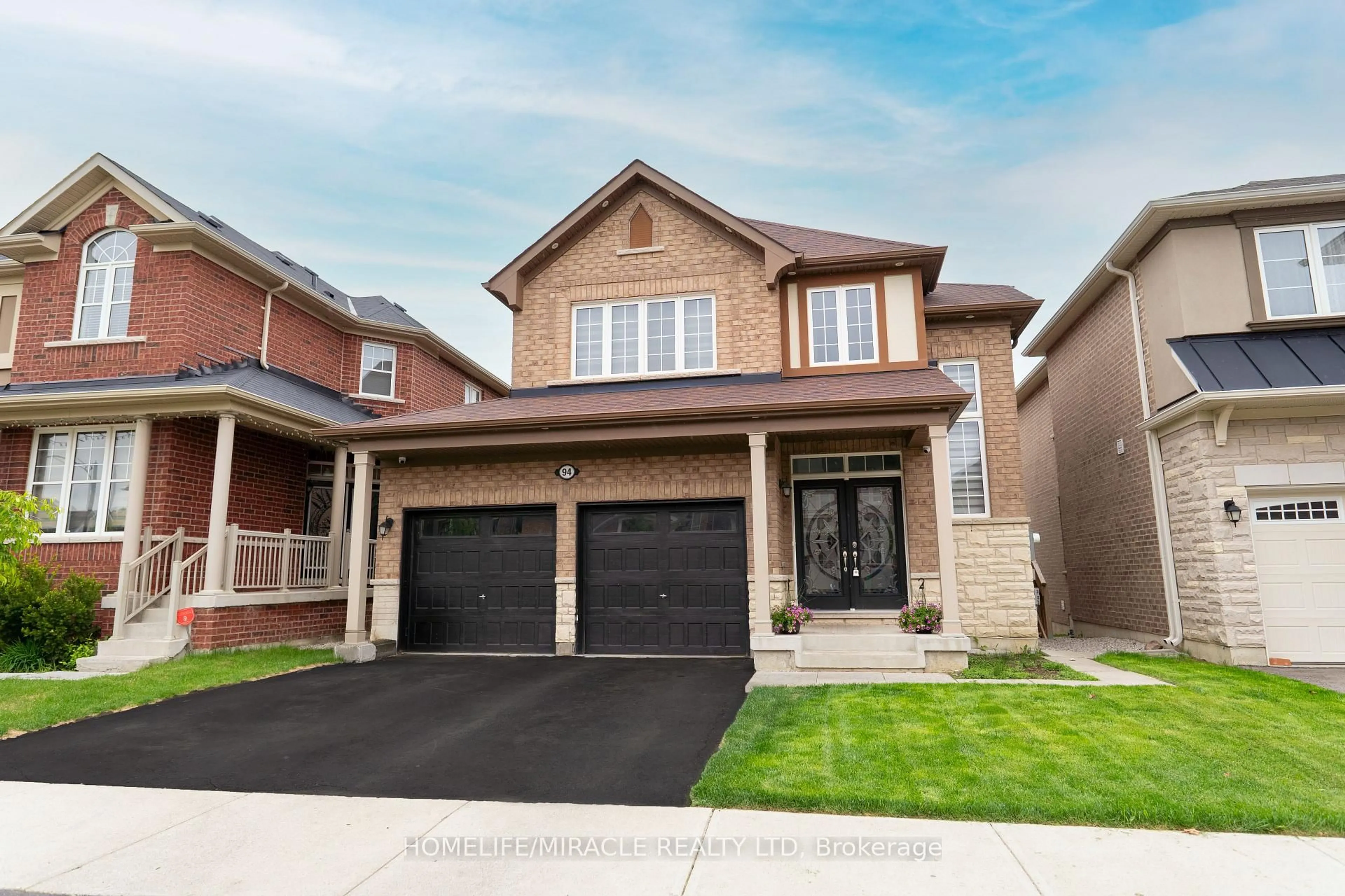 Home with brick exterior material, street for 94 Mincing Tr, Brampton Ontario L7A 4S9