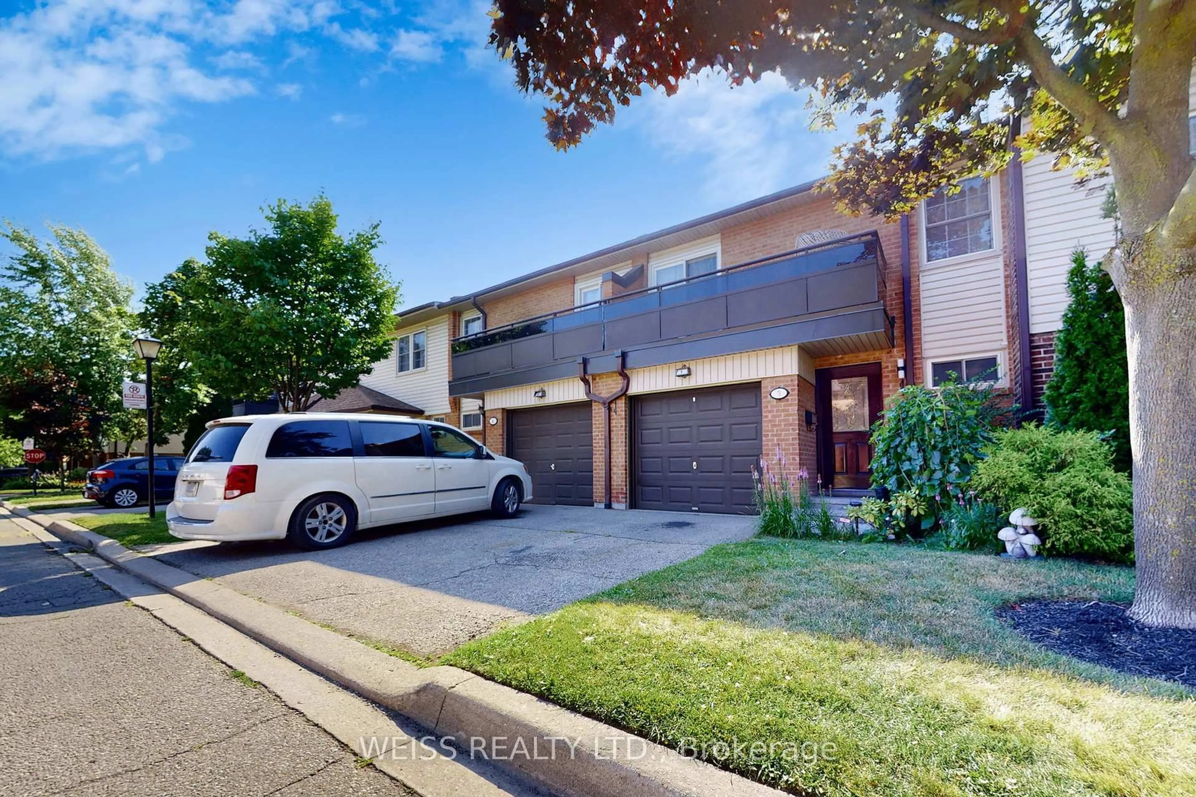Home with brick exterior material, street for 2120 Rathburn Rd #5, Mississauga Ontario L4W 2S8