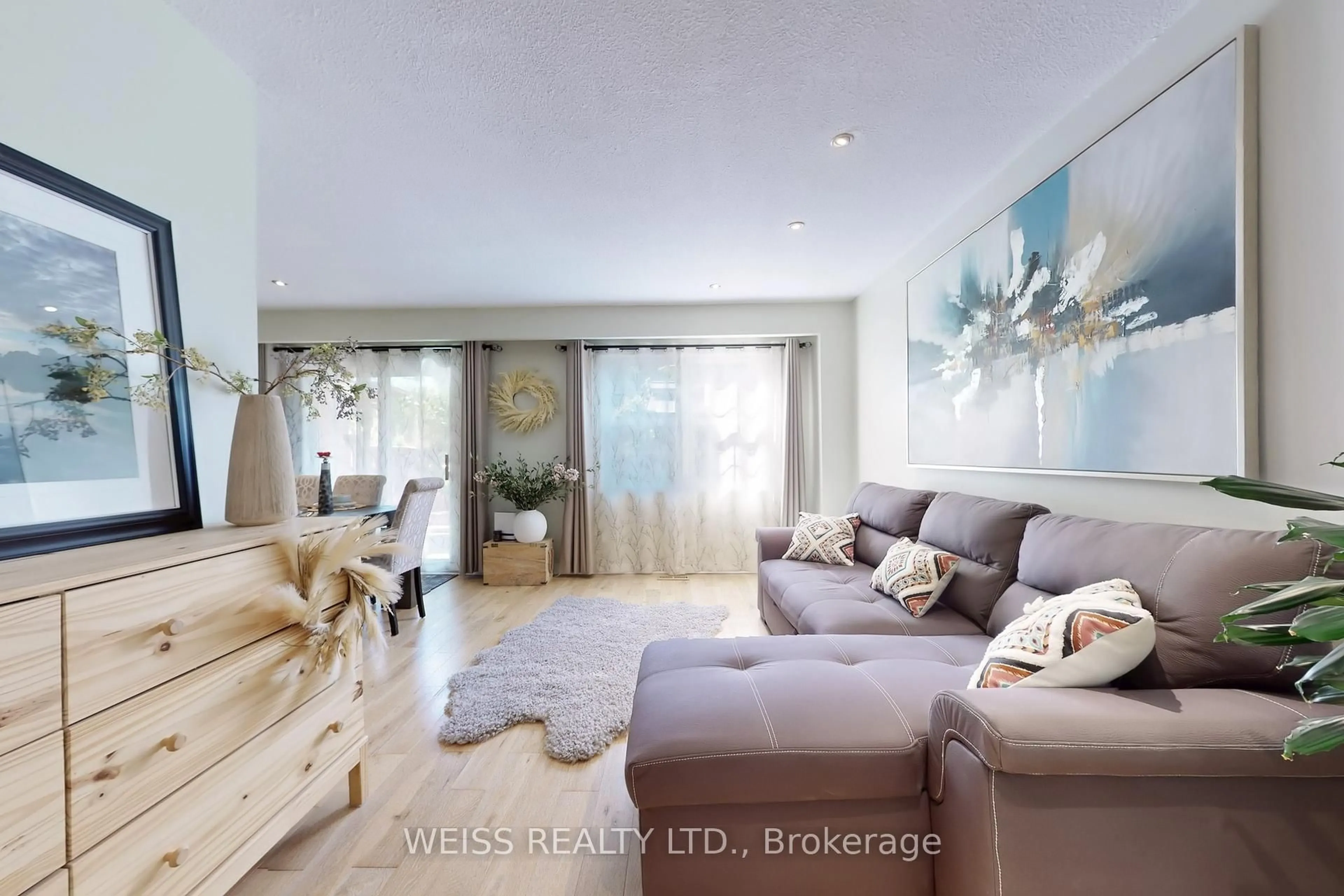 Living room with furniture, wood/laminate floor for 2120 Rathburn Rd #5, Mississauga Ontario L4W 2S8