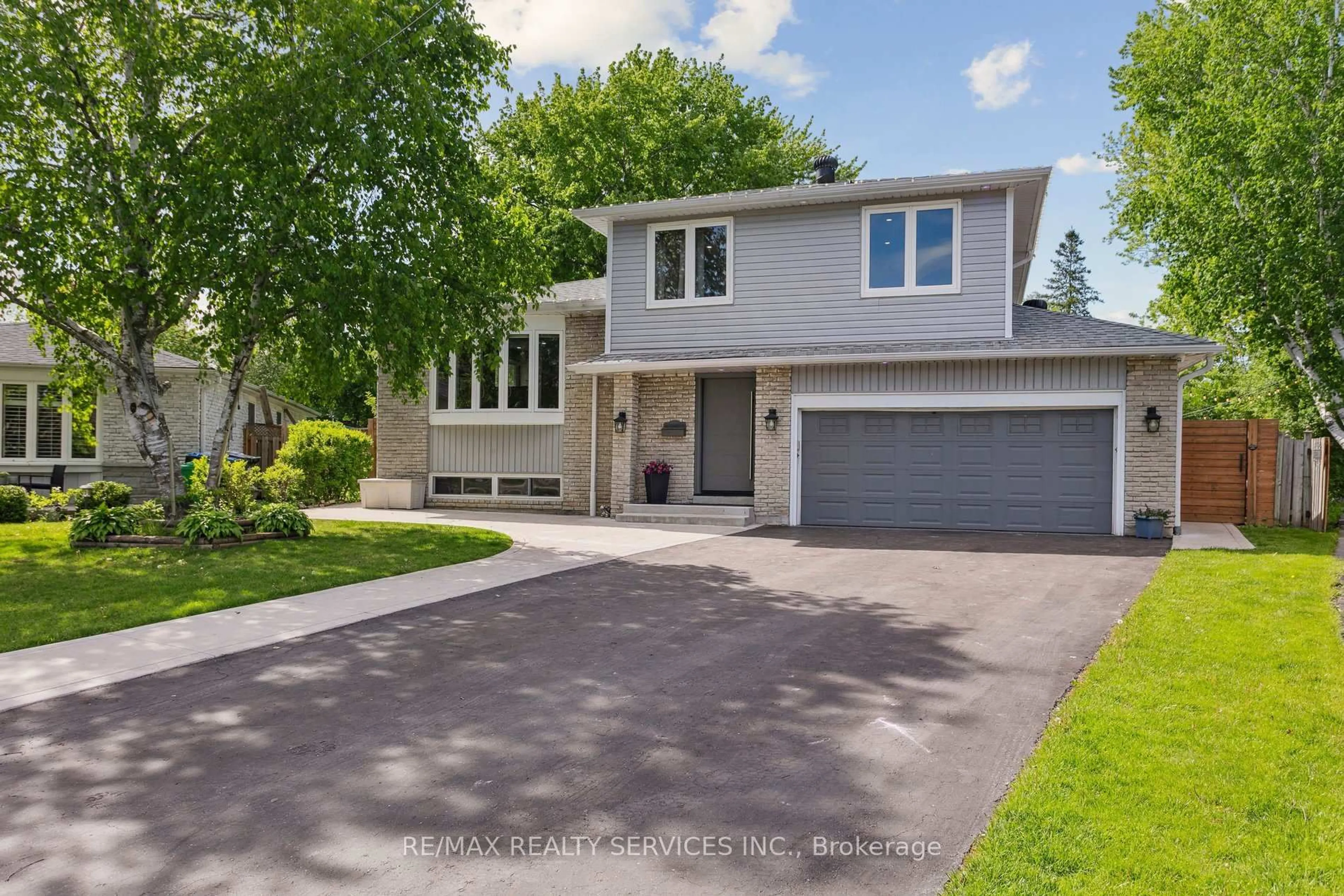 Home with vinyl exterior material, street for 16 Groveland Crt, Brampton Ontario L6S 1L4