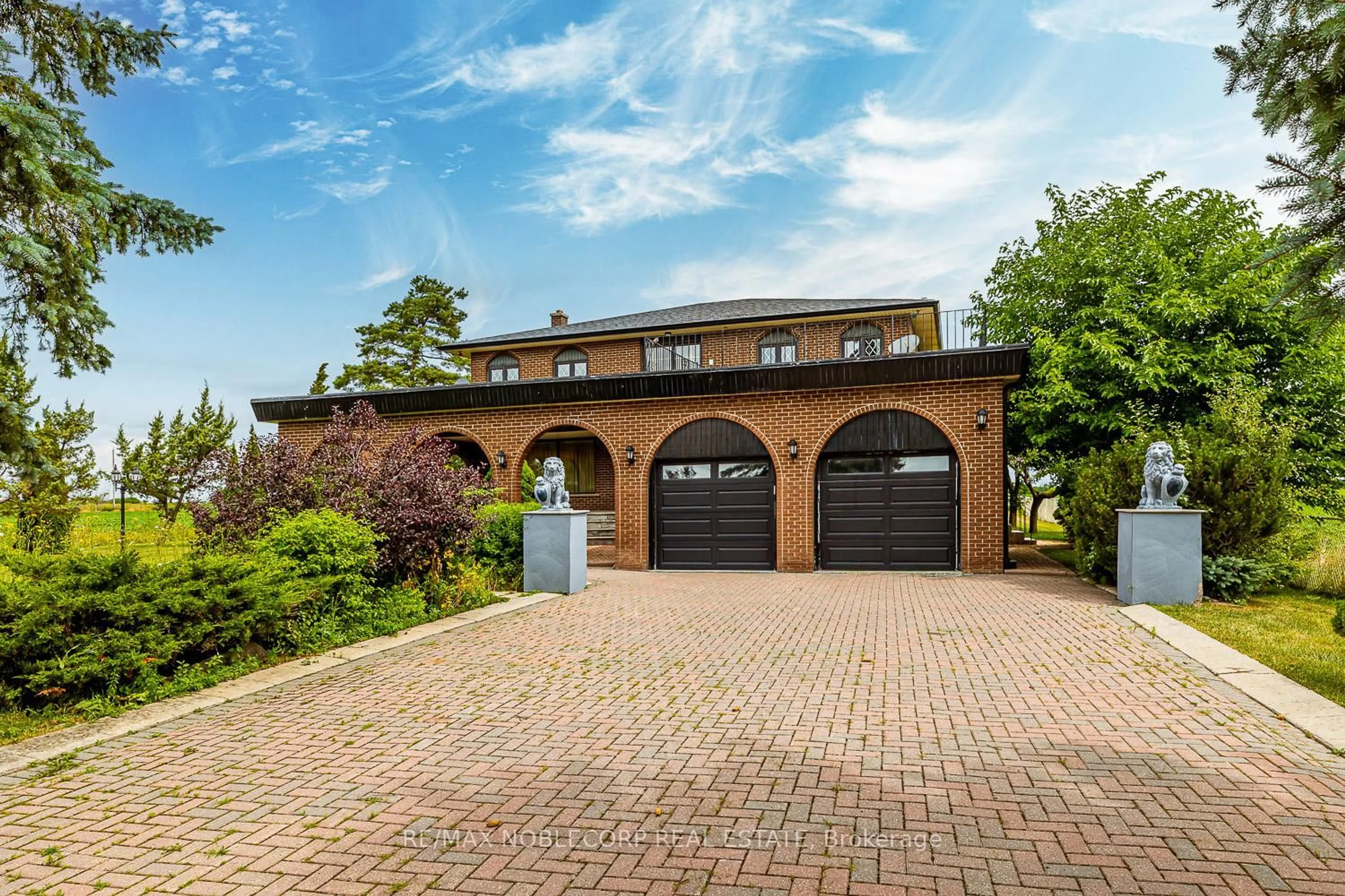 Home with brick exterior material, street for 10201 Clarkway Dr, Brampton Ontario L6P 0W3