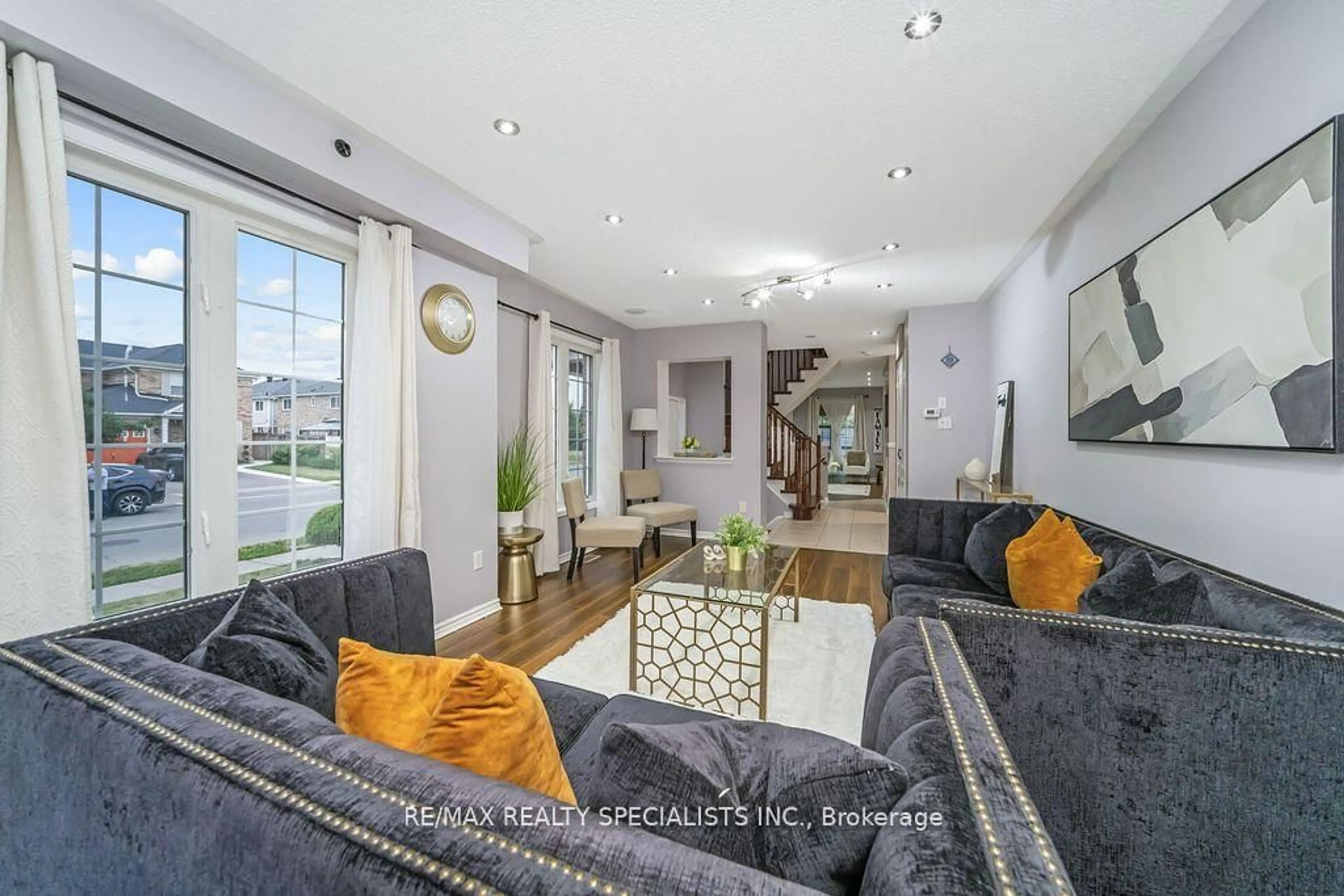Living room with furniture, unknown for 64 Botavia Downs Dr, Brampton Ontario L7A 3N8