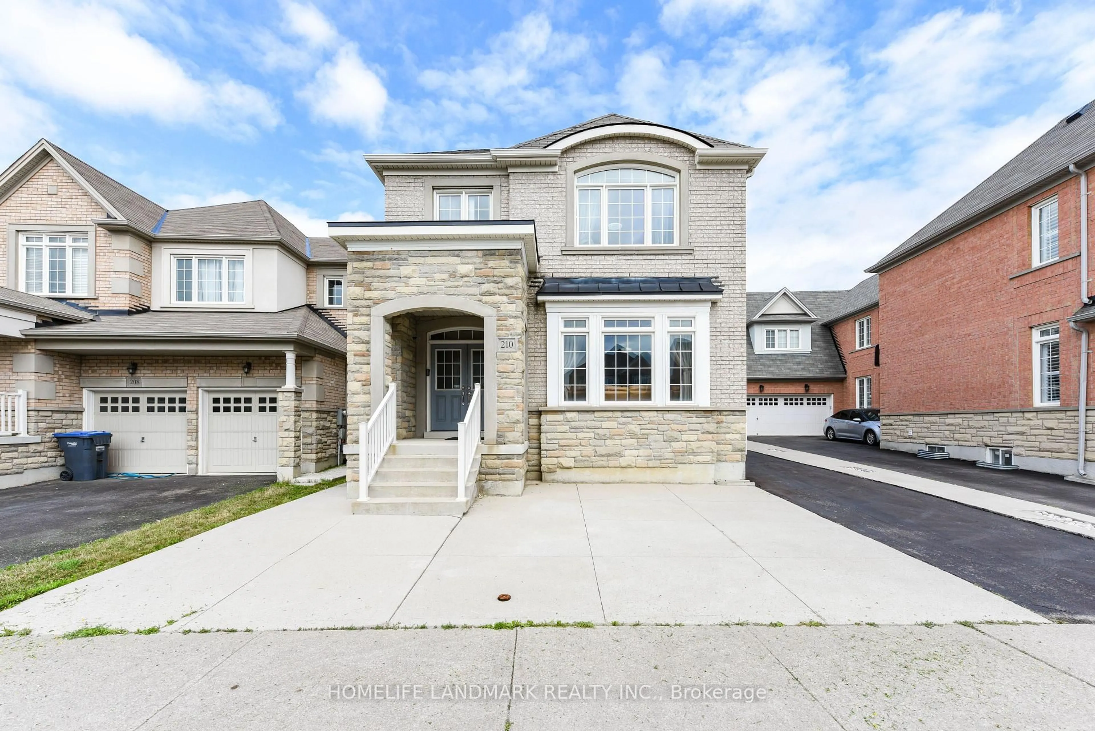 Home with brick exterior material, street for 210 Castle Oaks Crossing, Brampton Ontario L6P 3X2