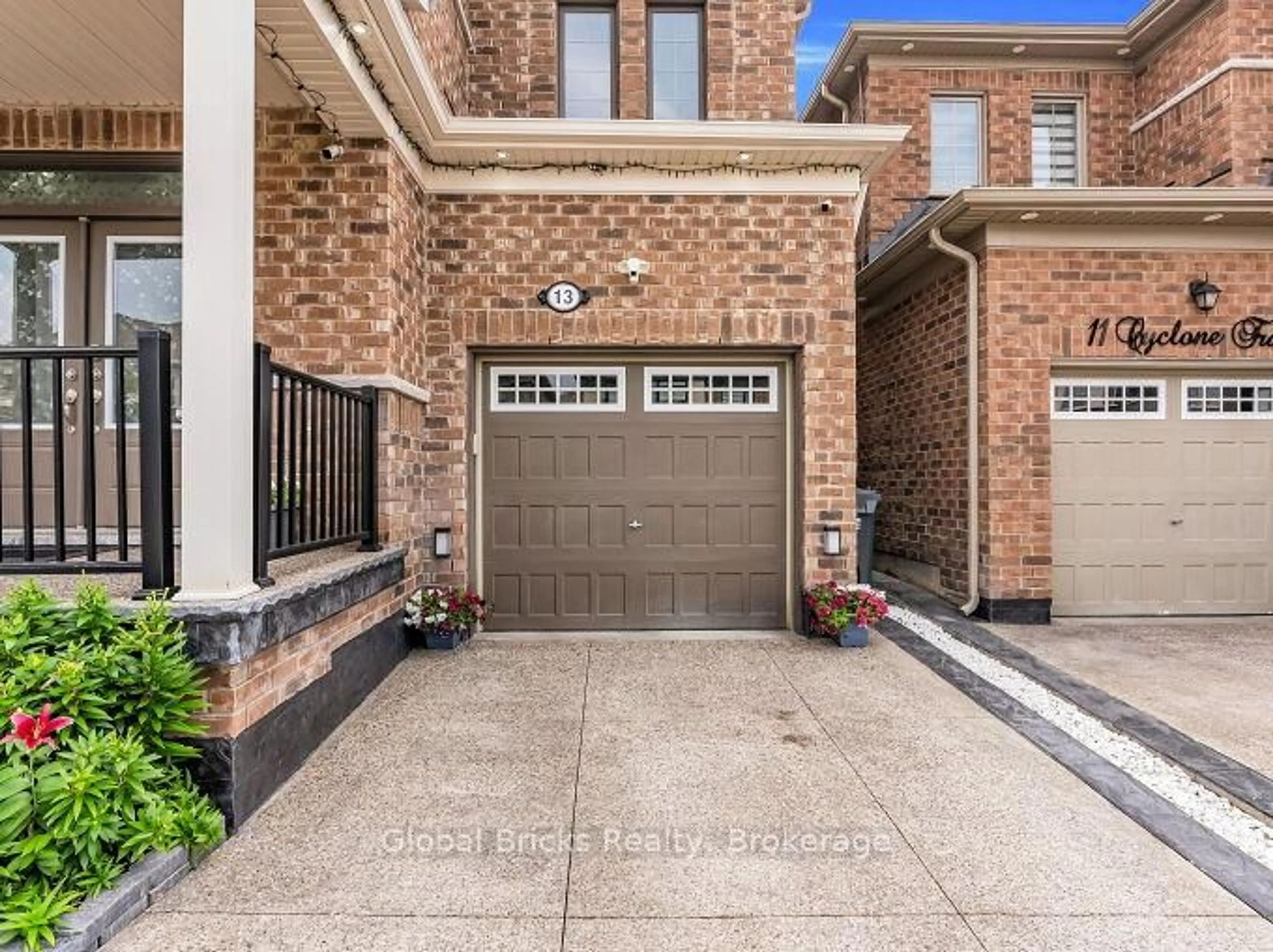 Home with brick exterior material, street for 13 Cyclone Tr, Brampton Ontario L7A 5E8