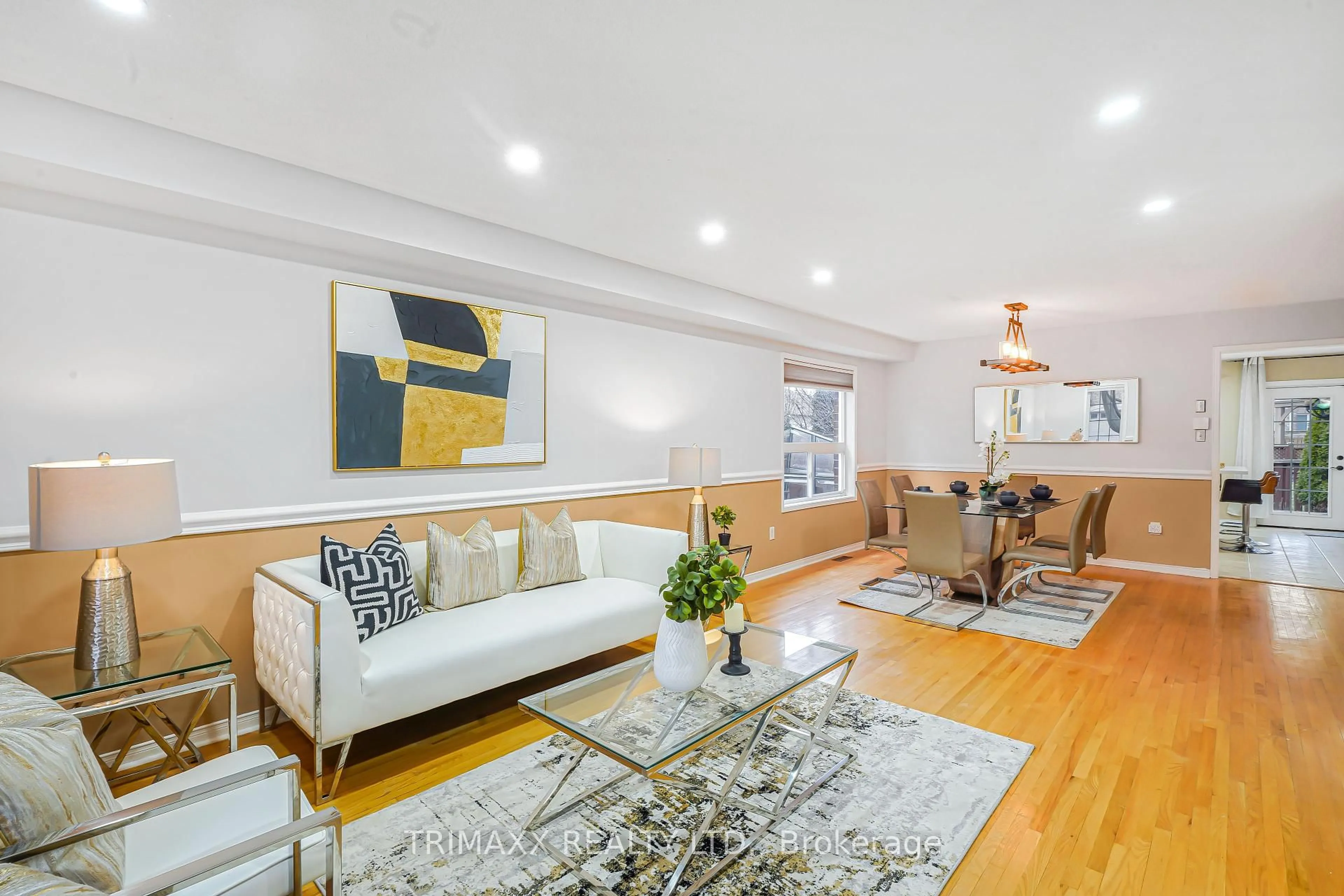 Living room with furniture, wood/laminate floor for 3 Turret Cres, Brampton Ontario L7A 2N9