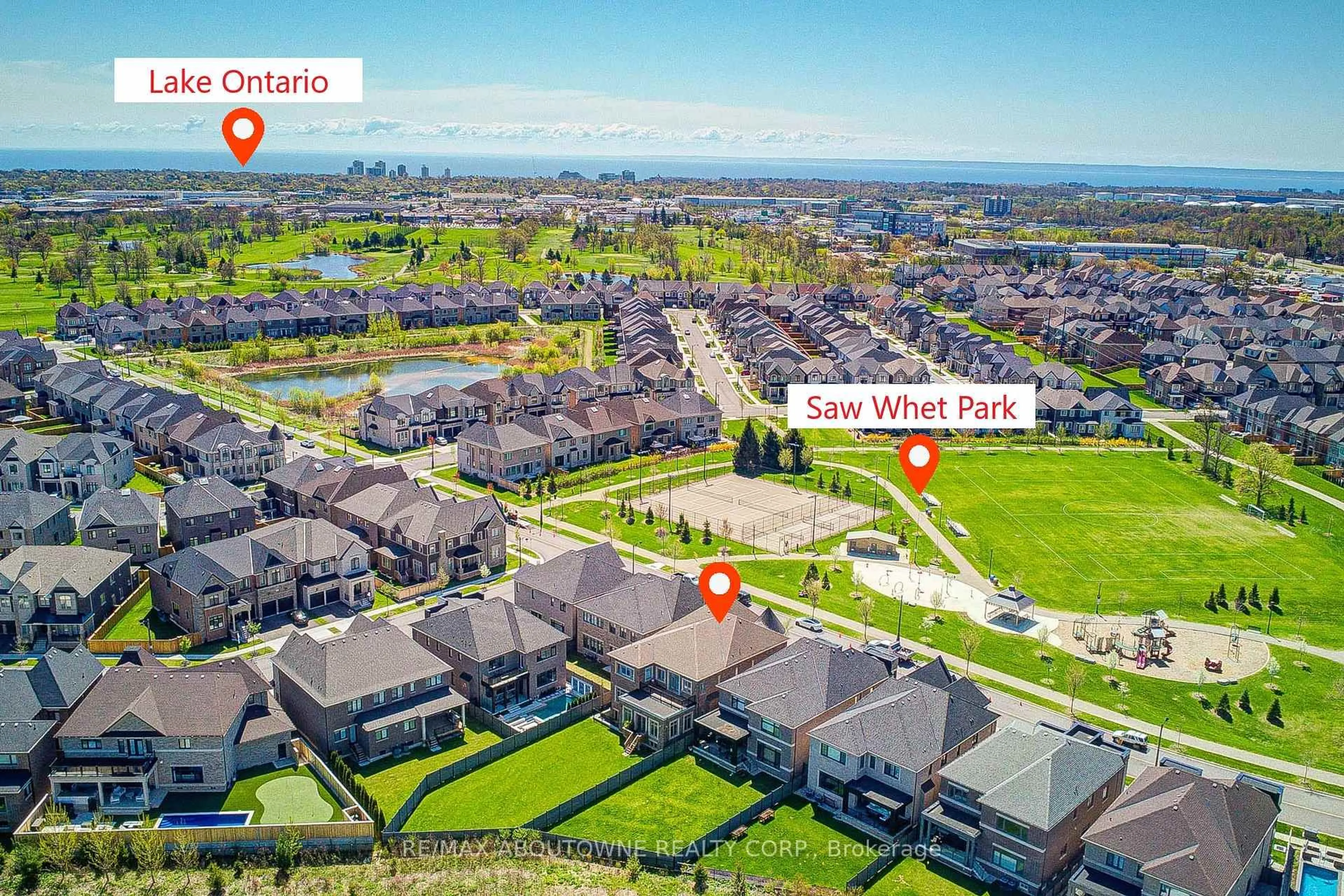A pic from outside/outdoor area/front of a property/back of a property/a pic from drone, water/lake/river/ocean view for 2359 Saw Whet Blvd, Oakville Ontario L6M 5M8