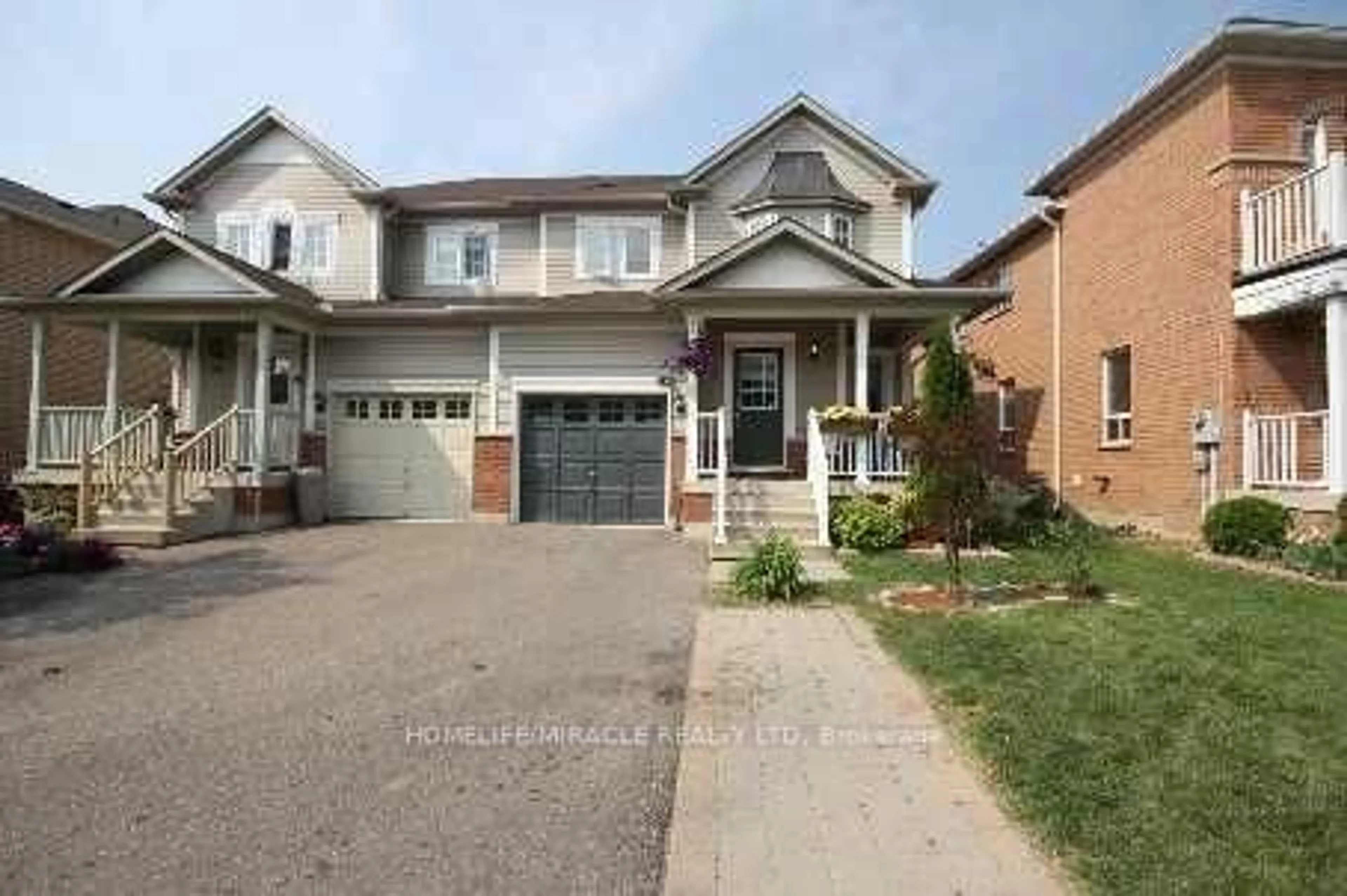 Home with brick exterior material, street for 52 Fordwich Blvd, Brampton Ontario L7A 1T2