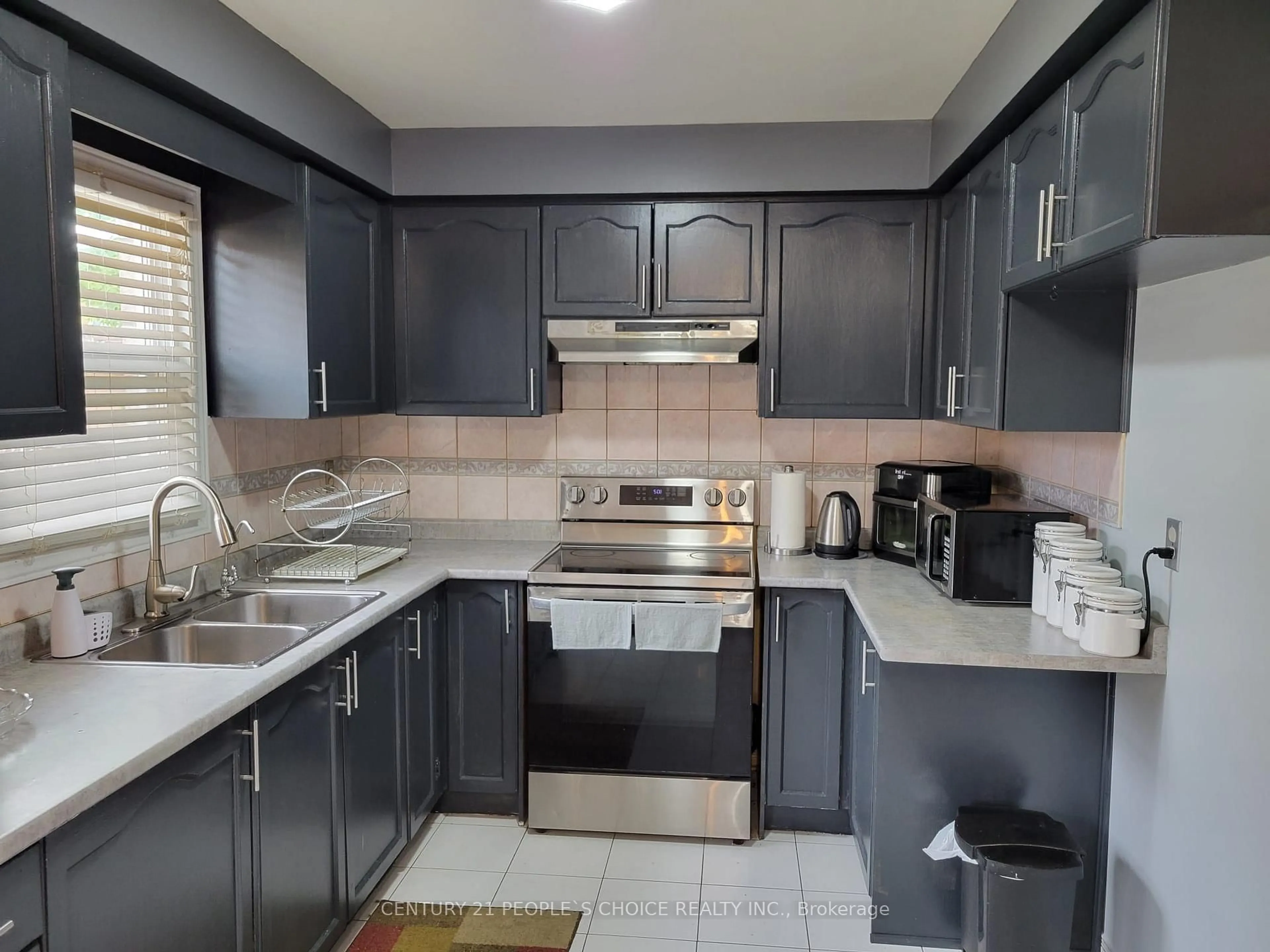 Standard kitchen, unknown for 164 Cinrickbar Dr, Toronto Ontario M9W 6W9