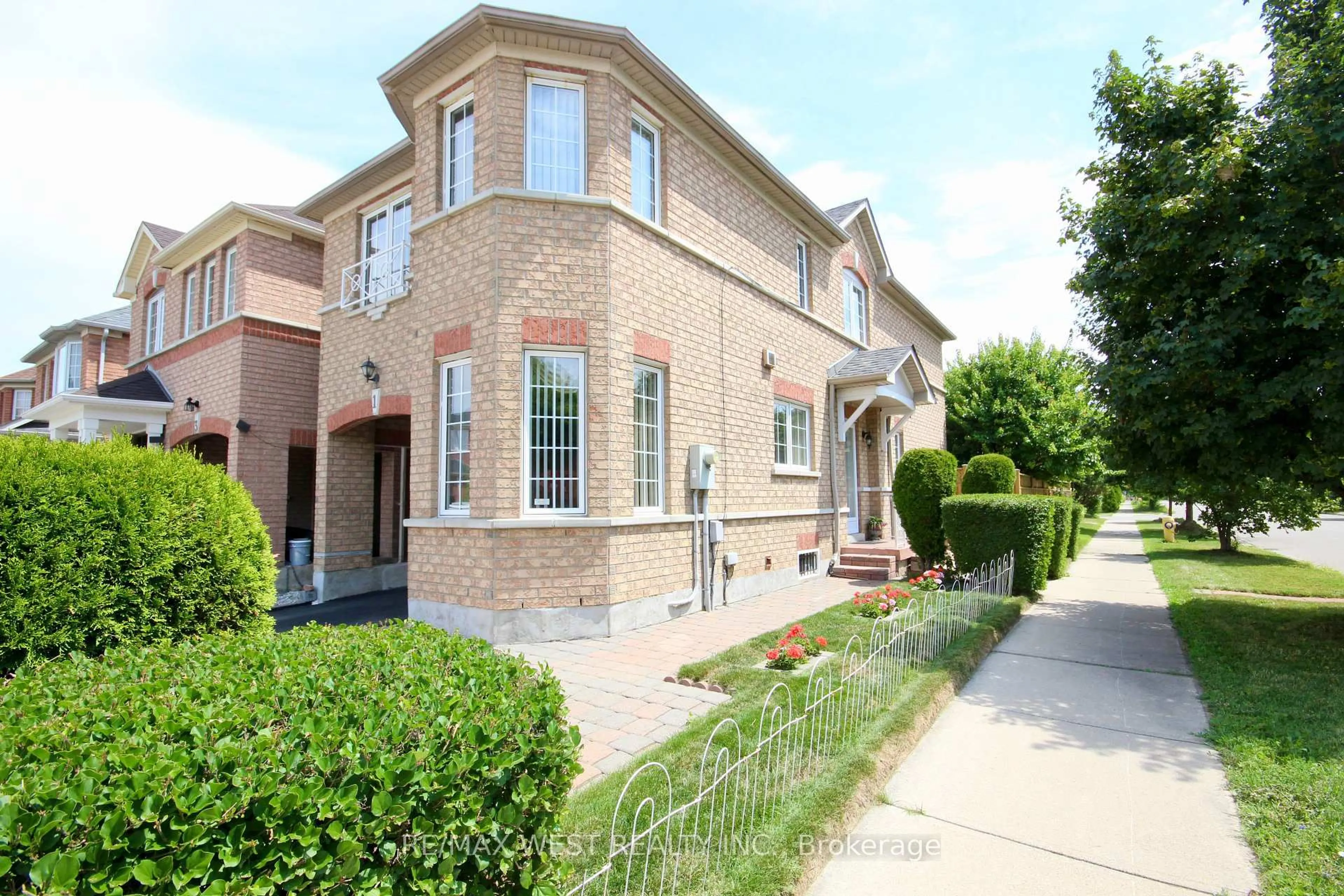 Home with brick exterior material, street for 1 Platinum Dr, Toronto Ontario M6M 5K1