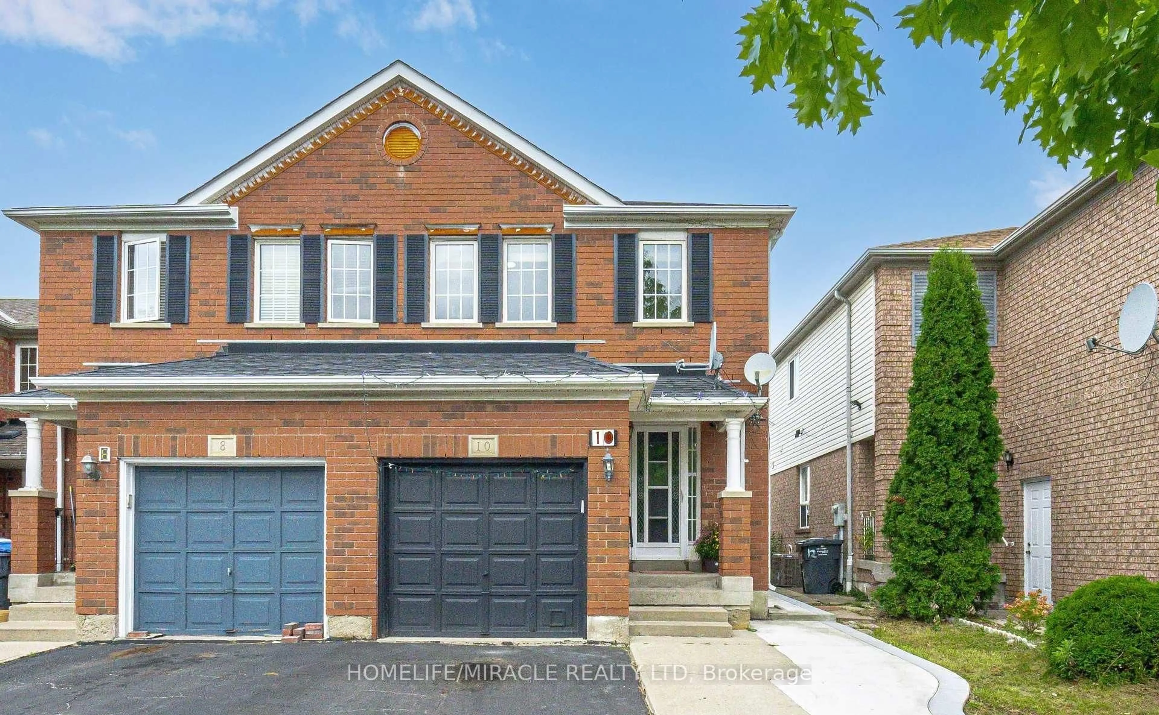 Home with brick exterior material, street for 10 Hackberry Gate, Brampton Ontario L6R 2E7