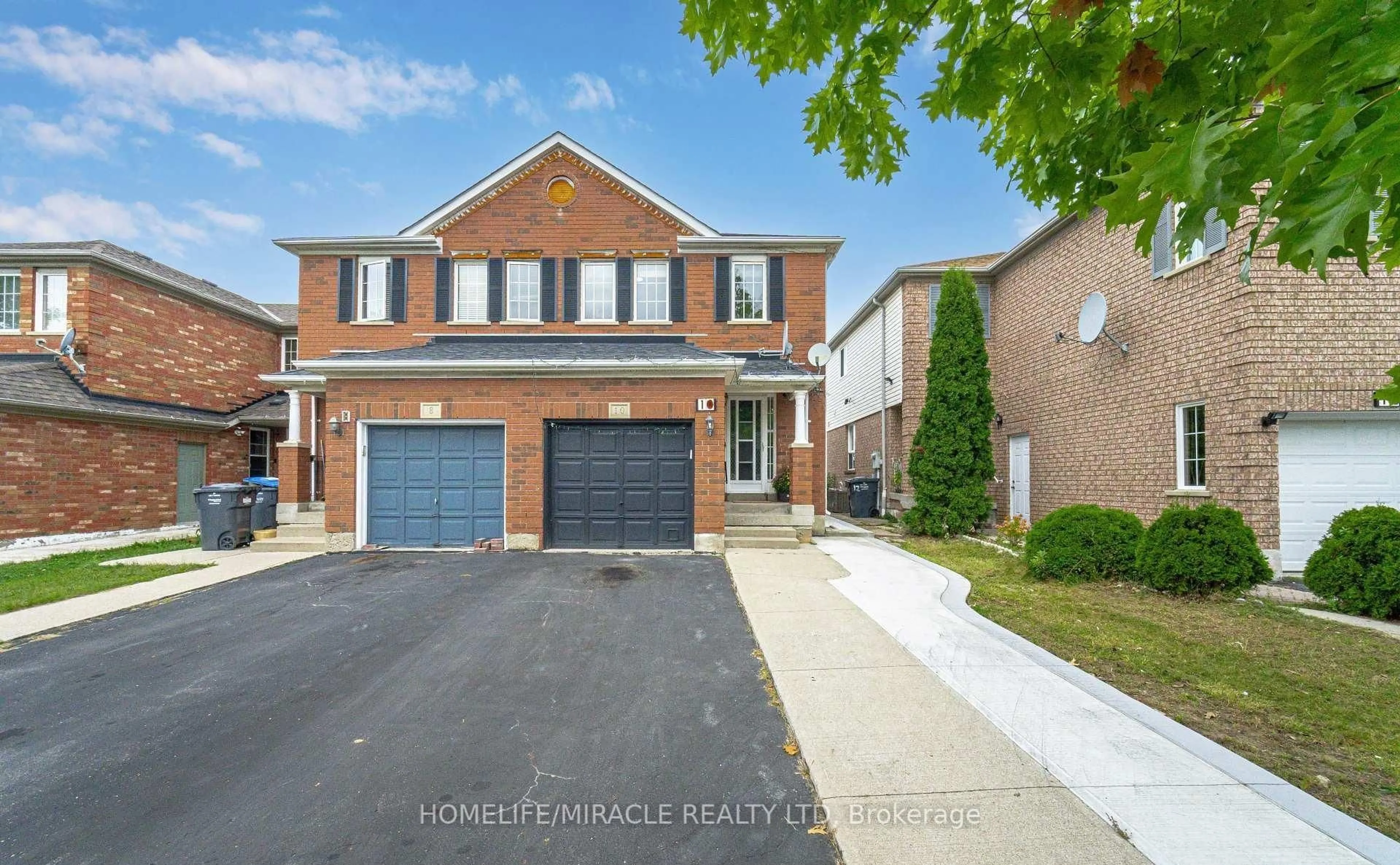 Home with brick exterior material, street for 10 Hackberry Gate, Brampton Ontario L6R 2E7