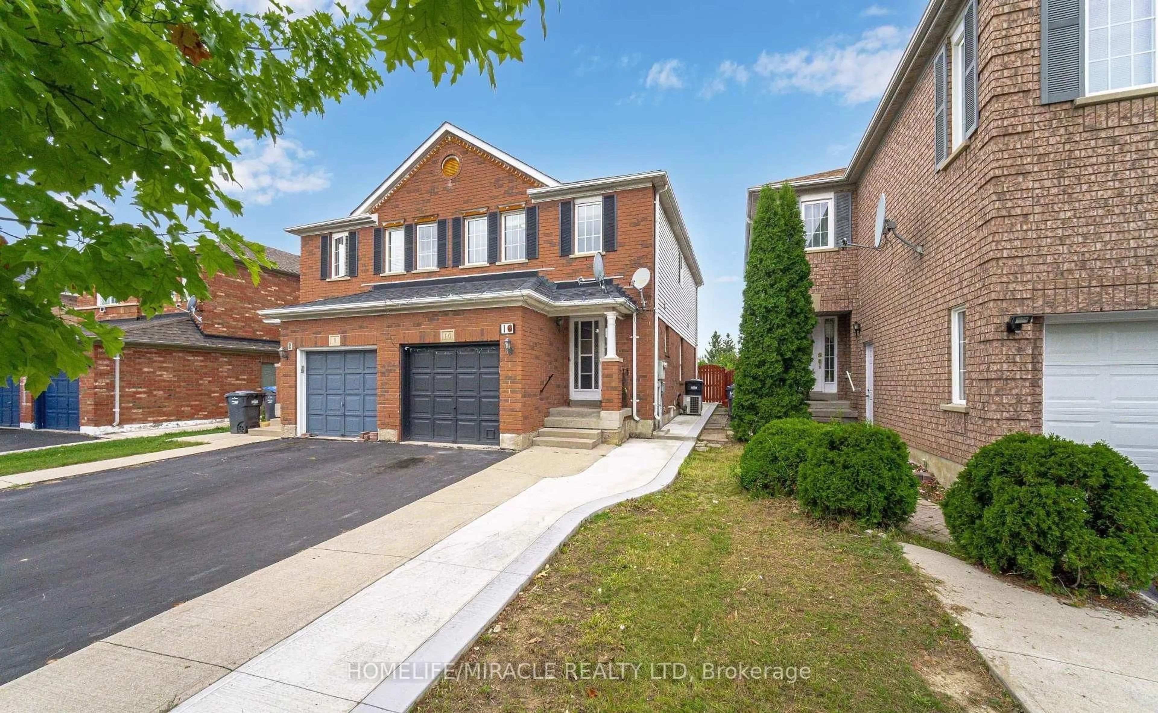 Home with brick exterior material, street for 10 Hackberry Gate, Brampton Ontario L6R 2E7