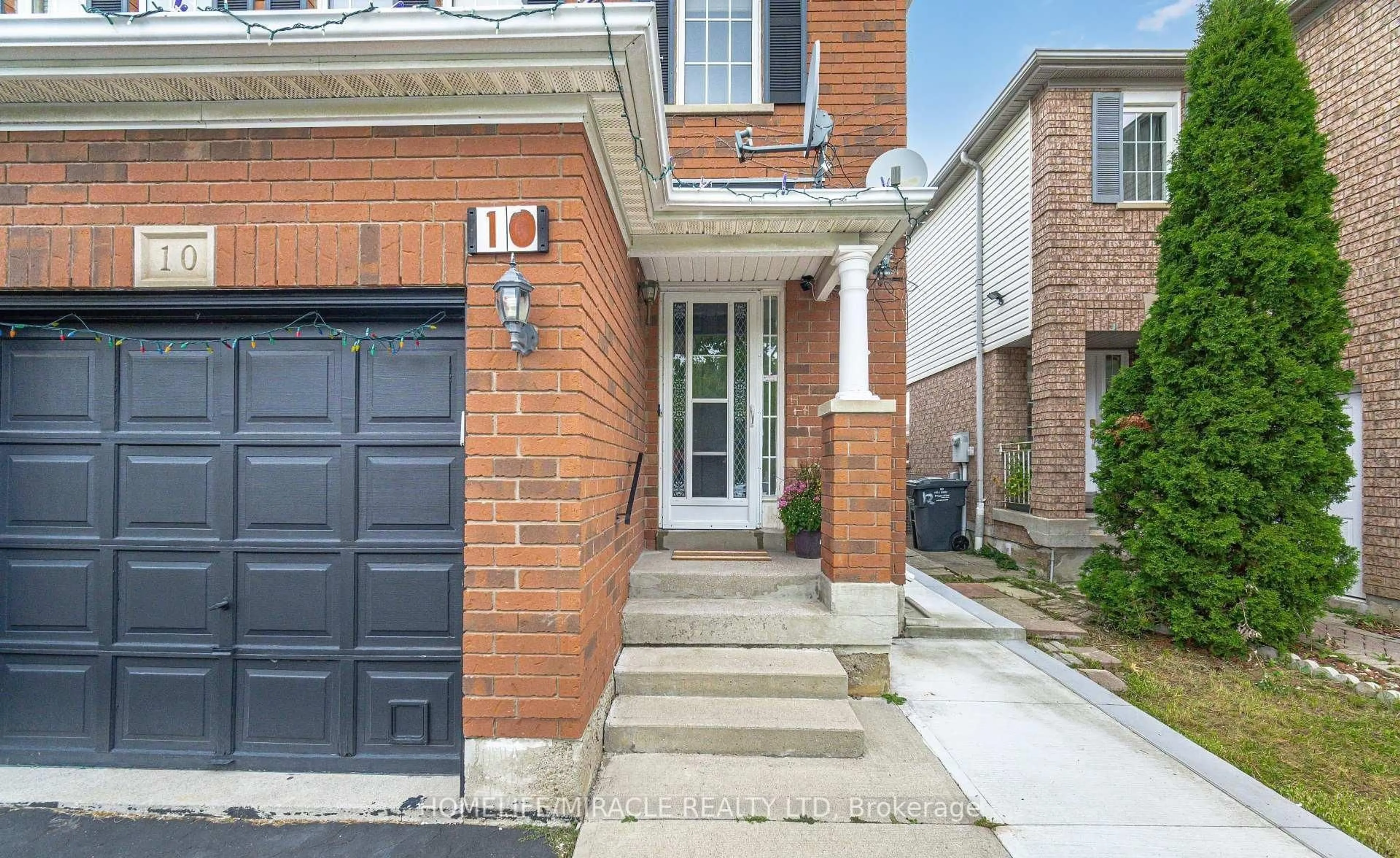 Home with brick exterior material, street for 10 Hackberry Gate, Brampton Ontario L6R 2E7
