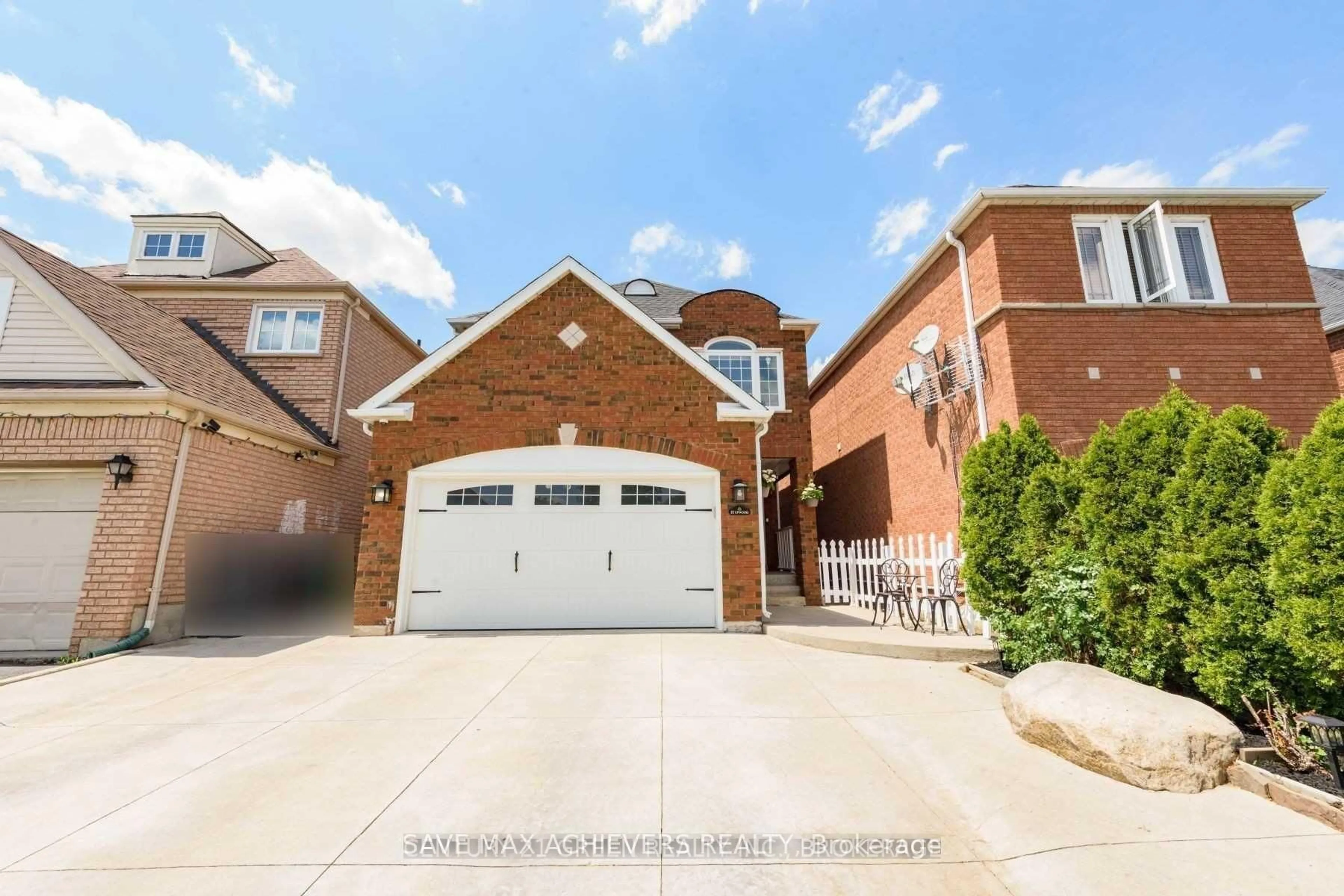 Home with brick exterior material, street for 12 Upwood Pl, Brampton Ontario L6R 1T3