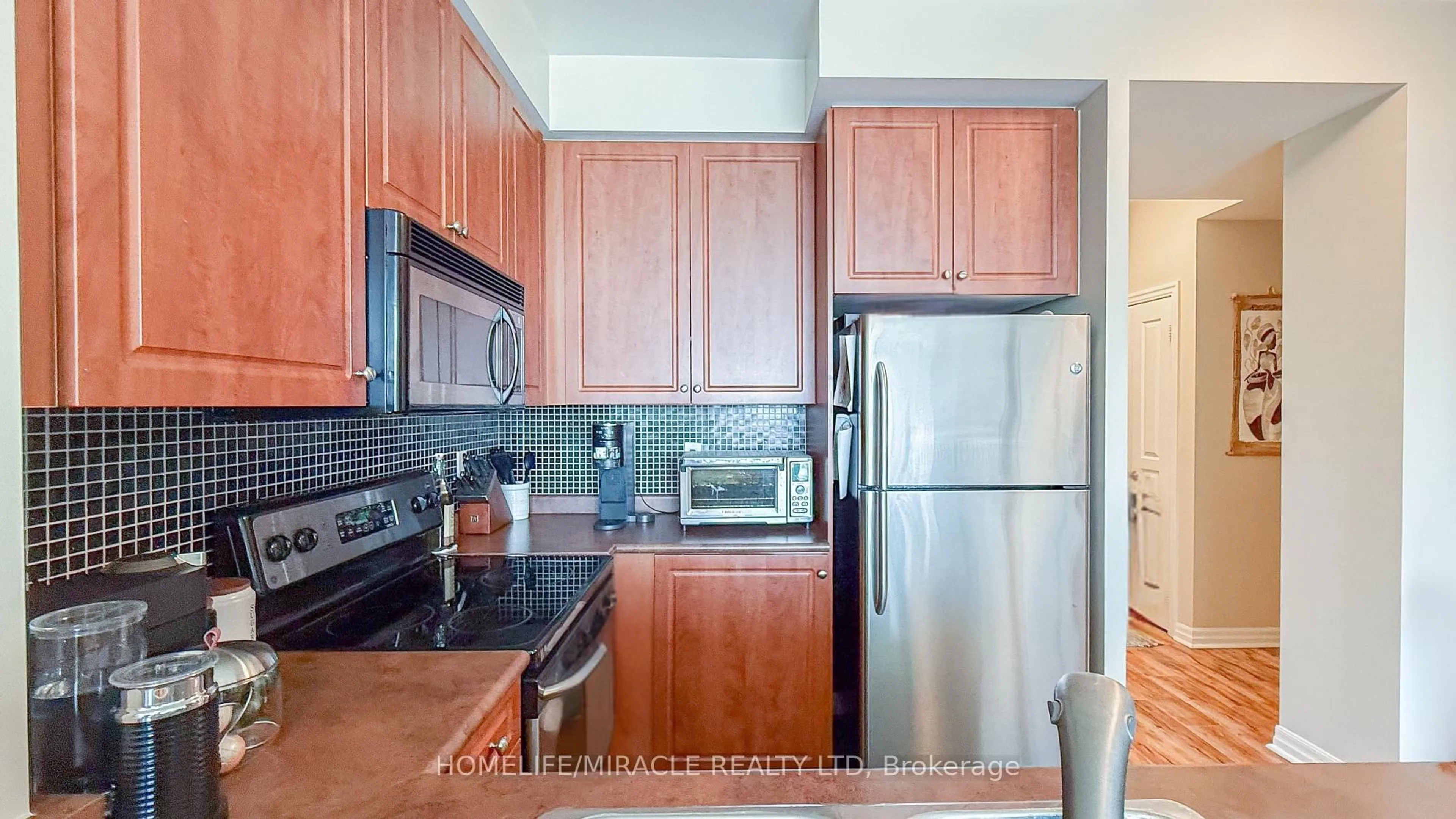 Standard kitchen, ceramic/tile floor for 220 Burnhamthorpe Rd #2803, Mississauga Ontario L5B 4N4