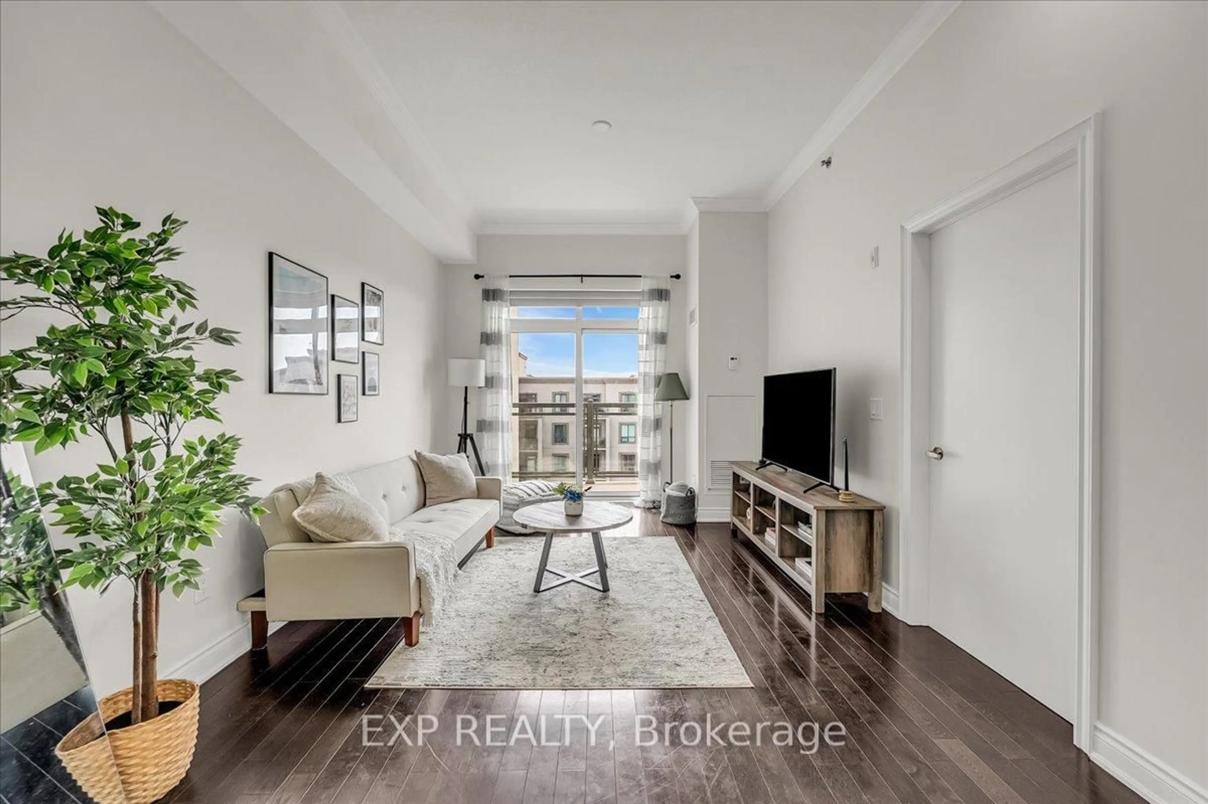 Living room with furniture, unknown for 2486 Old Bronte Rd #819, Oakville Ontario L6M 0Y4