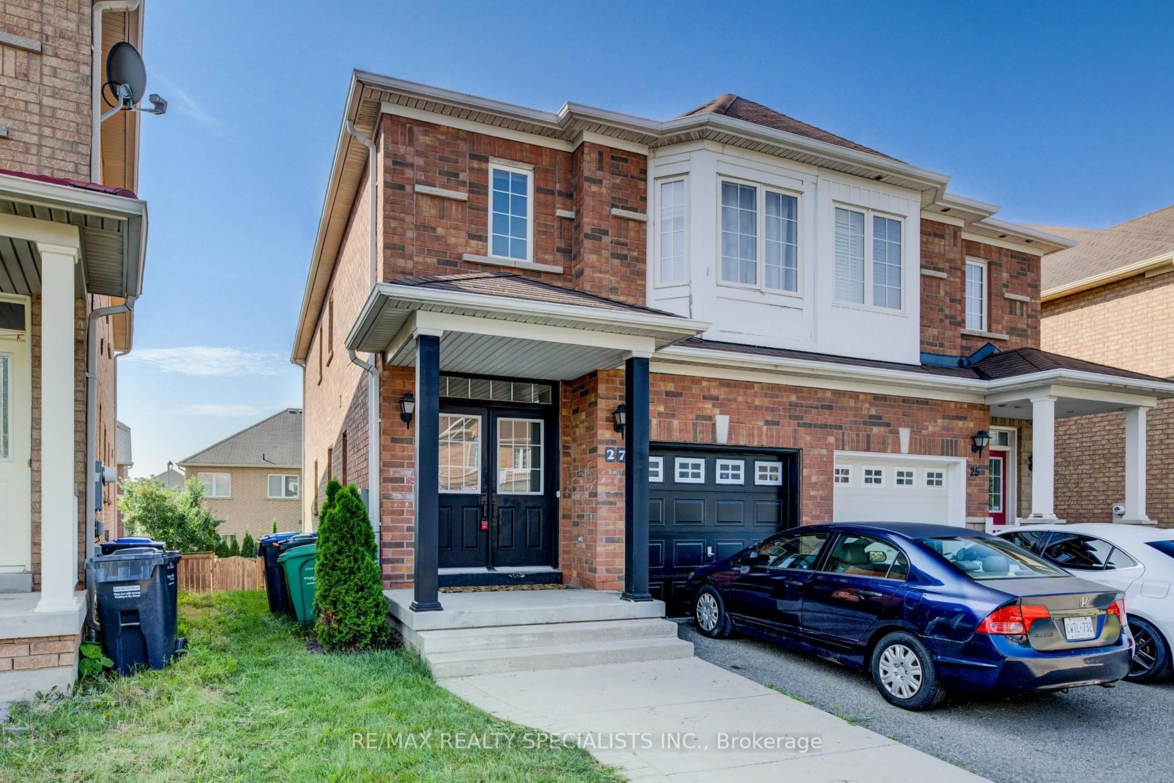 Home with brick exterior material, street for 27 Portrush Tr, Brampton Ontario L6X 0R2