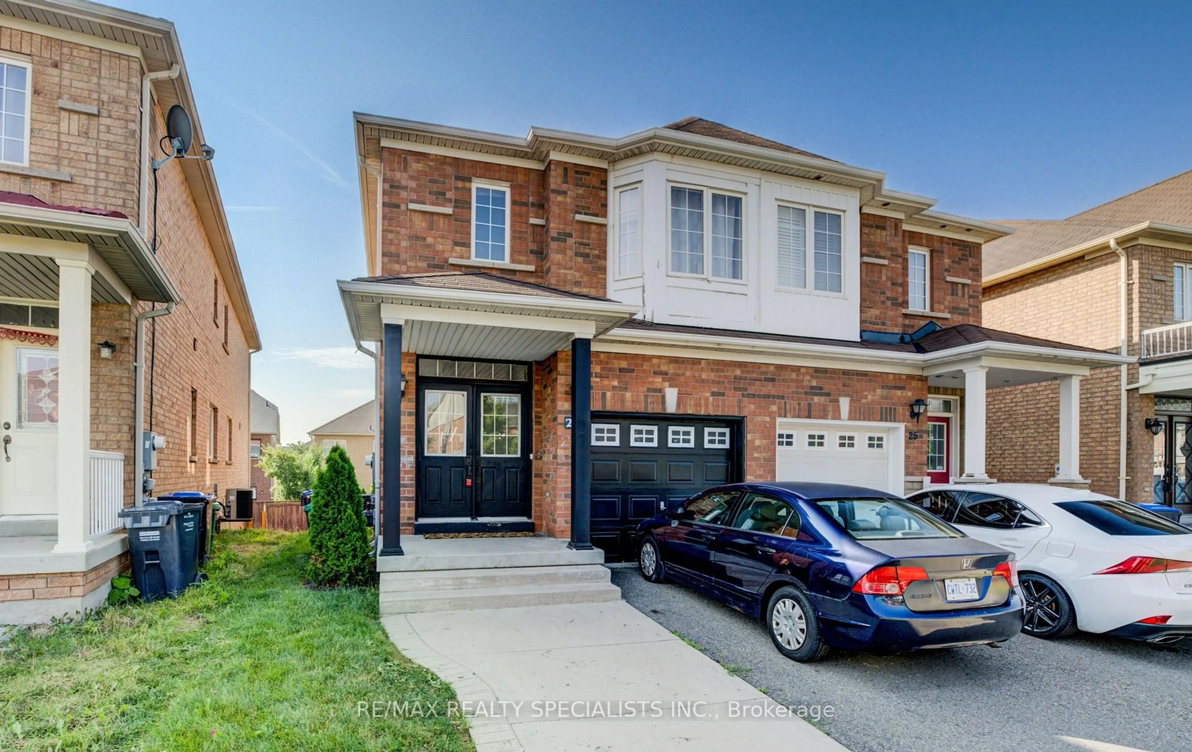 Home with brick exterior material, street for 27 Portrush Tr, Brampton Ontario L6X 0R2