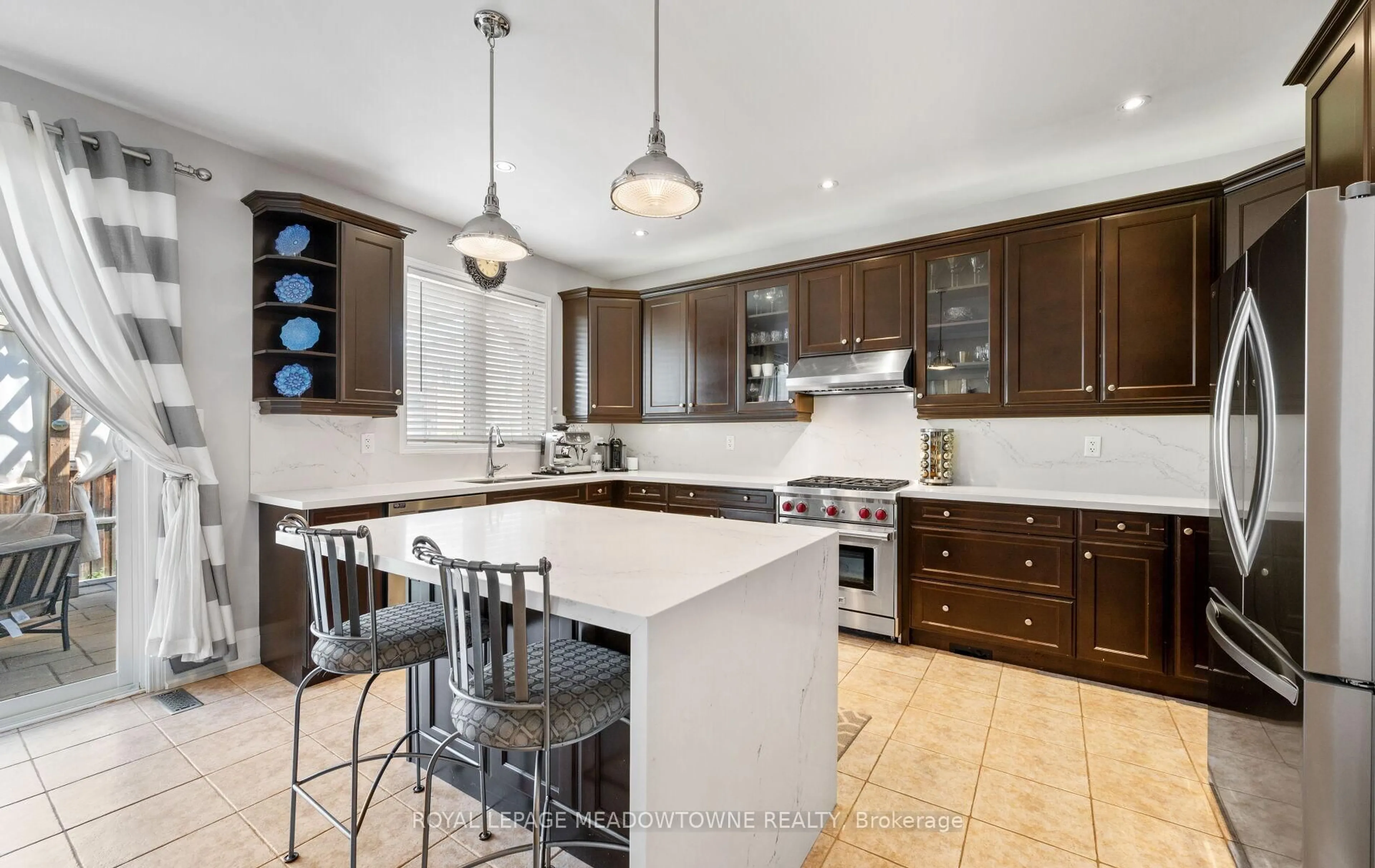 Open concept kitchen, ceramic/tile floor for 663 Snider Terr, Milton Ontario L9T 7R8