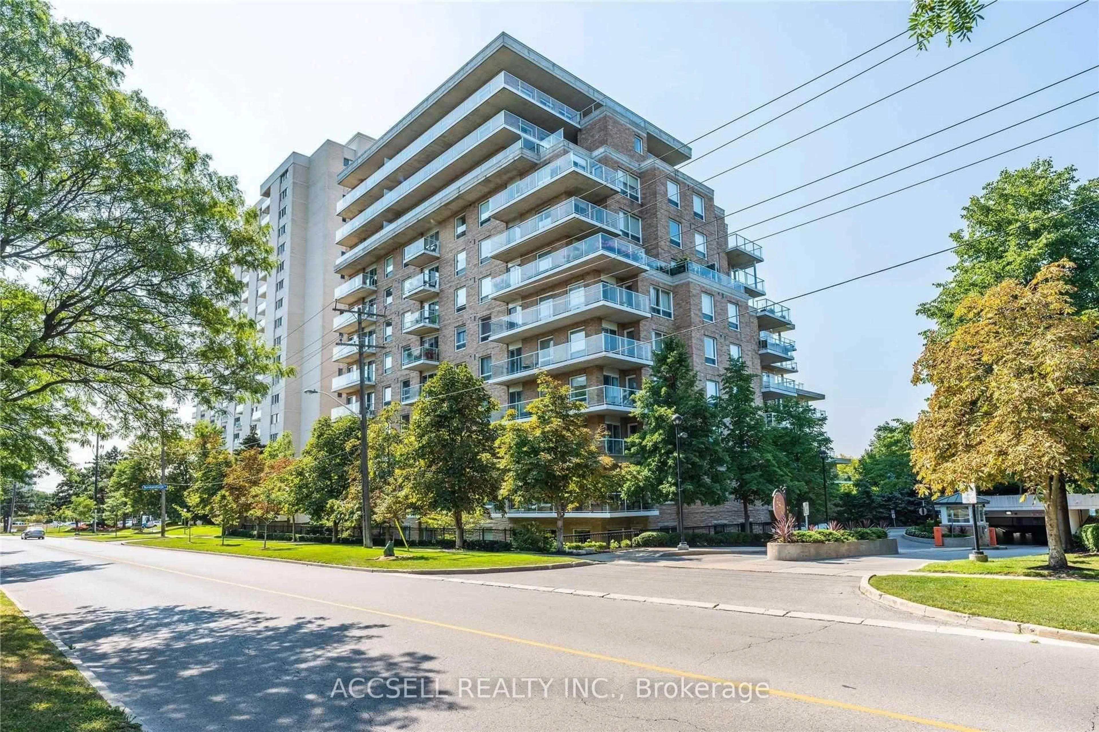 A pic from outside/outdoor area/front of a property/back of a property/a pic from drone, unknown for 350 Mill Rd #103, Toronto Ontario M9C 5R7