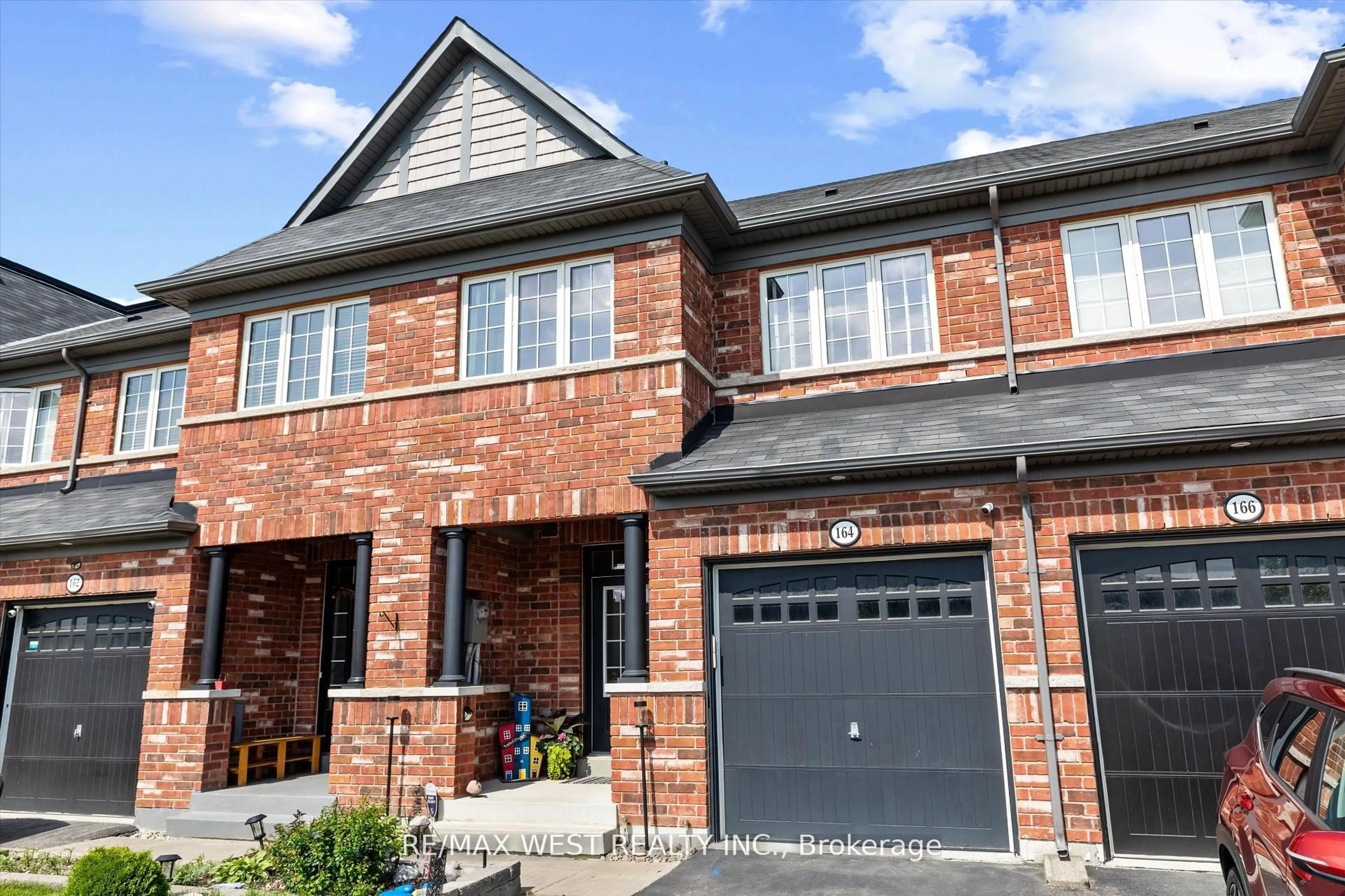 Home with brick exterior material, street for 164 Sussexvale Dr, Brampton Ontario L6R 3R2