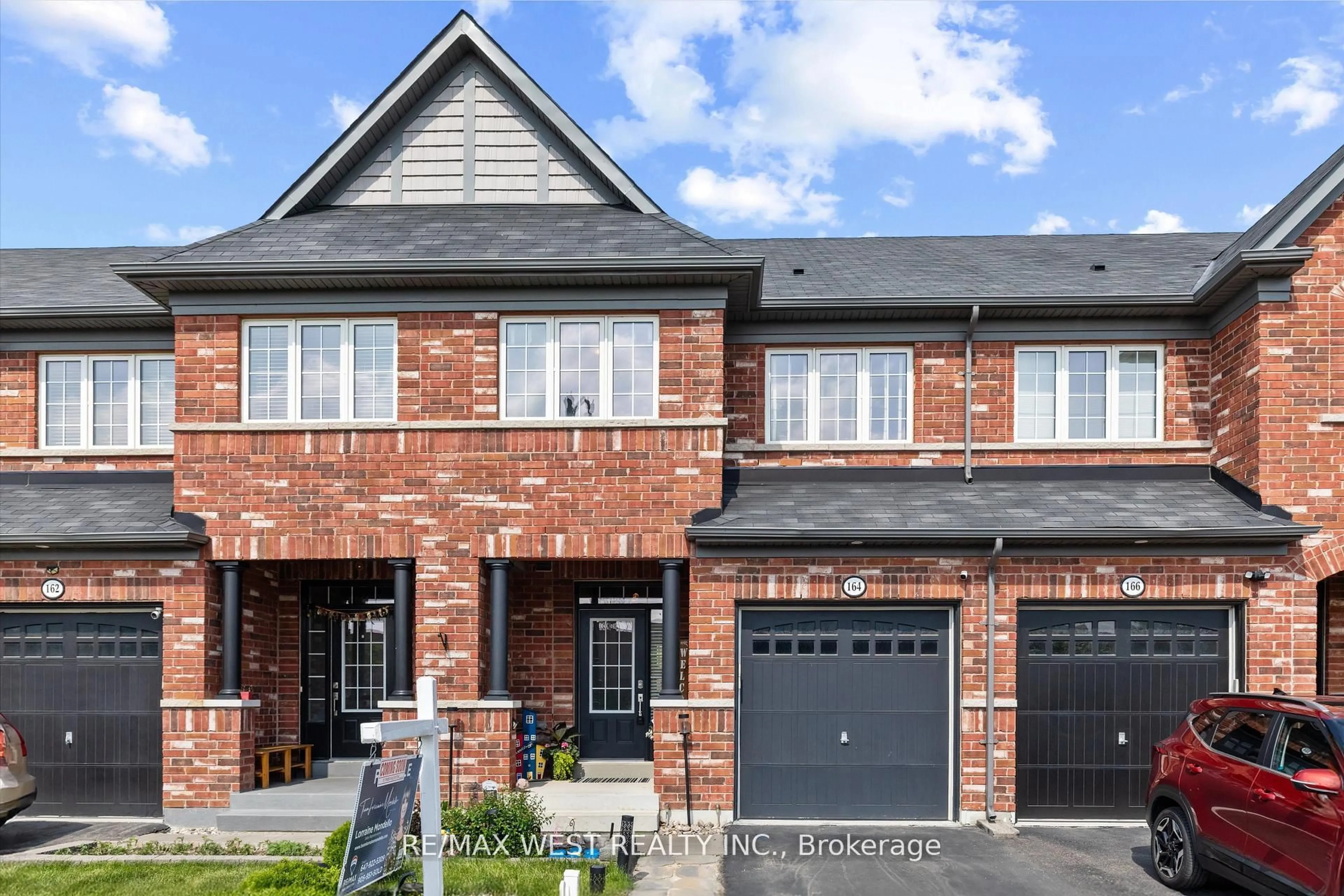 Home with brick exterior material, street for 164 Sussexvale Dr, Brampton Ontario L6R 3R2