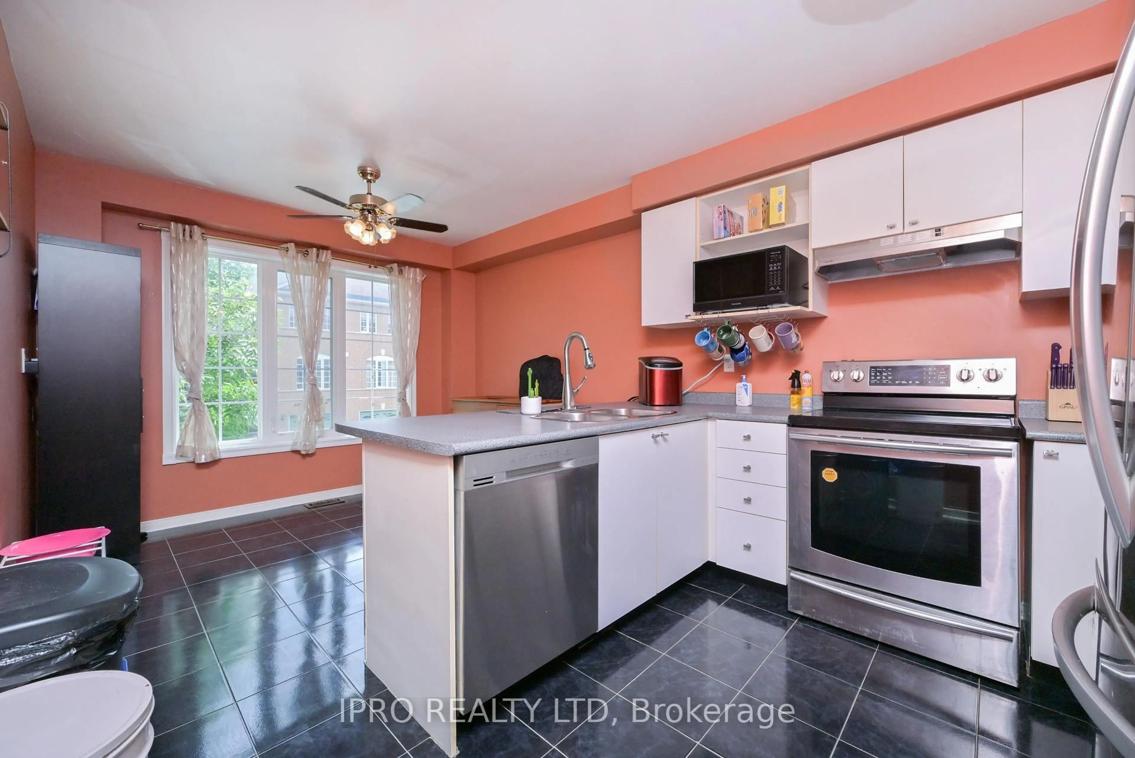 Standard kitchen, ceramic/tile floor for 65 Brickyard Way #27, Brampton Ontario L6V 4M2