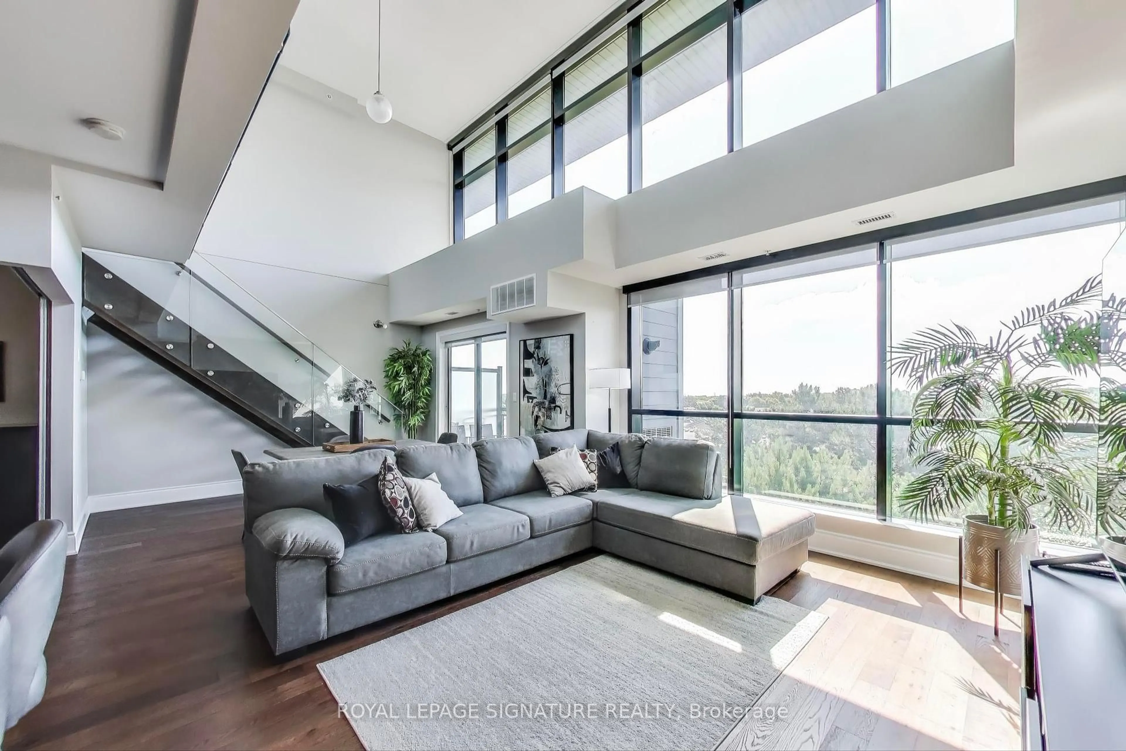 Living room with furniture, unknown for 3170 Erin Mills Pkwy #405, Mississauga Ontario L5L 0B6