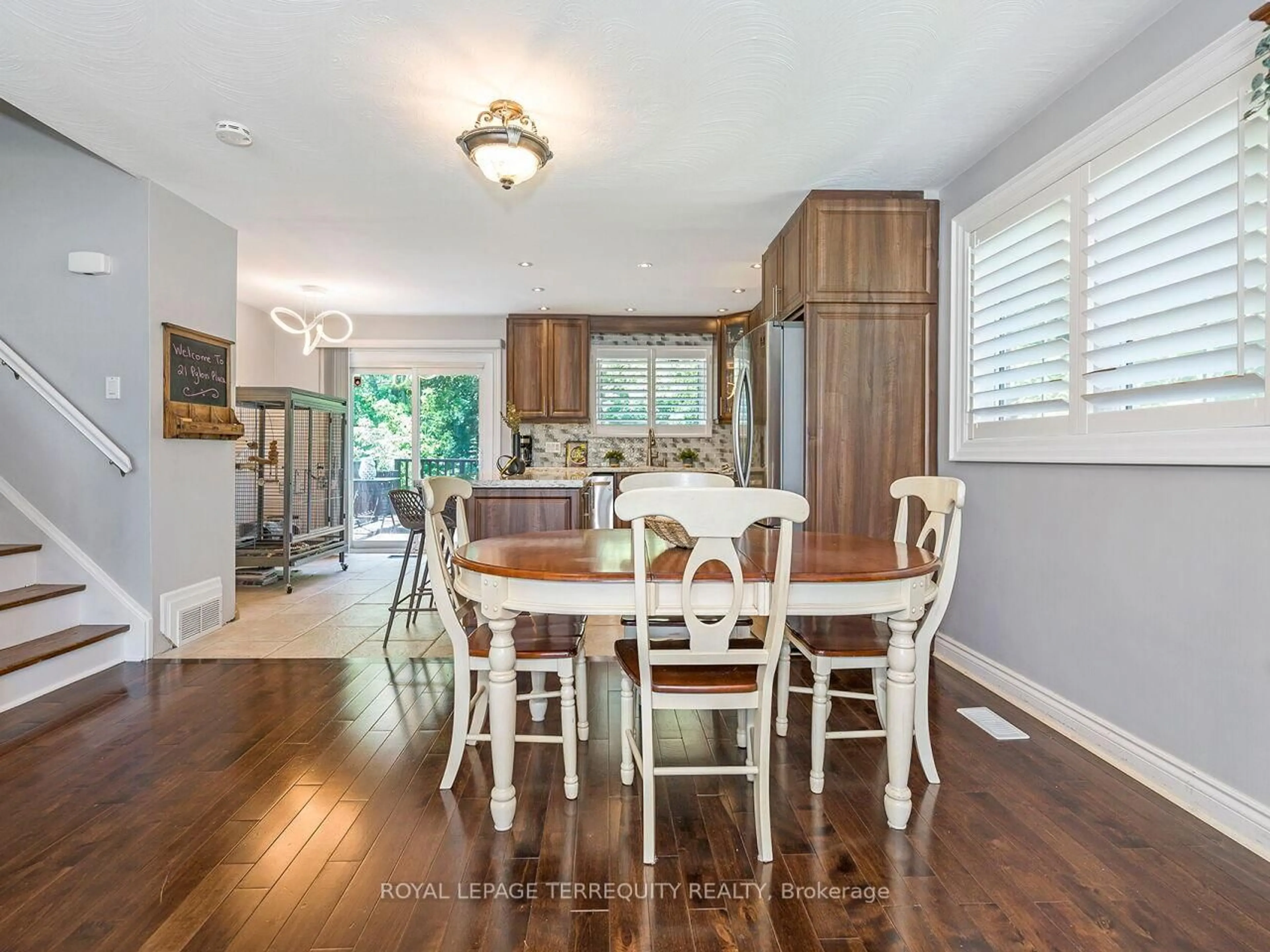 Open concept kitchen, wood/laminate floor for 21 Pylon Pl, Toronto Ontario M9W 2P3