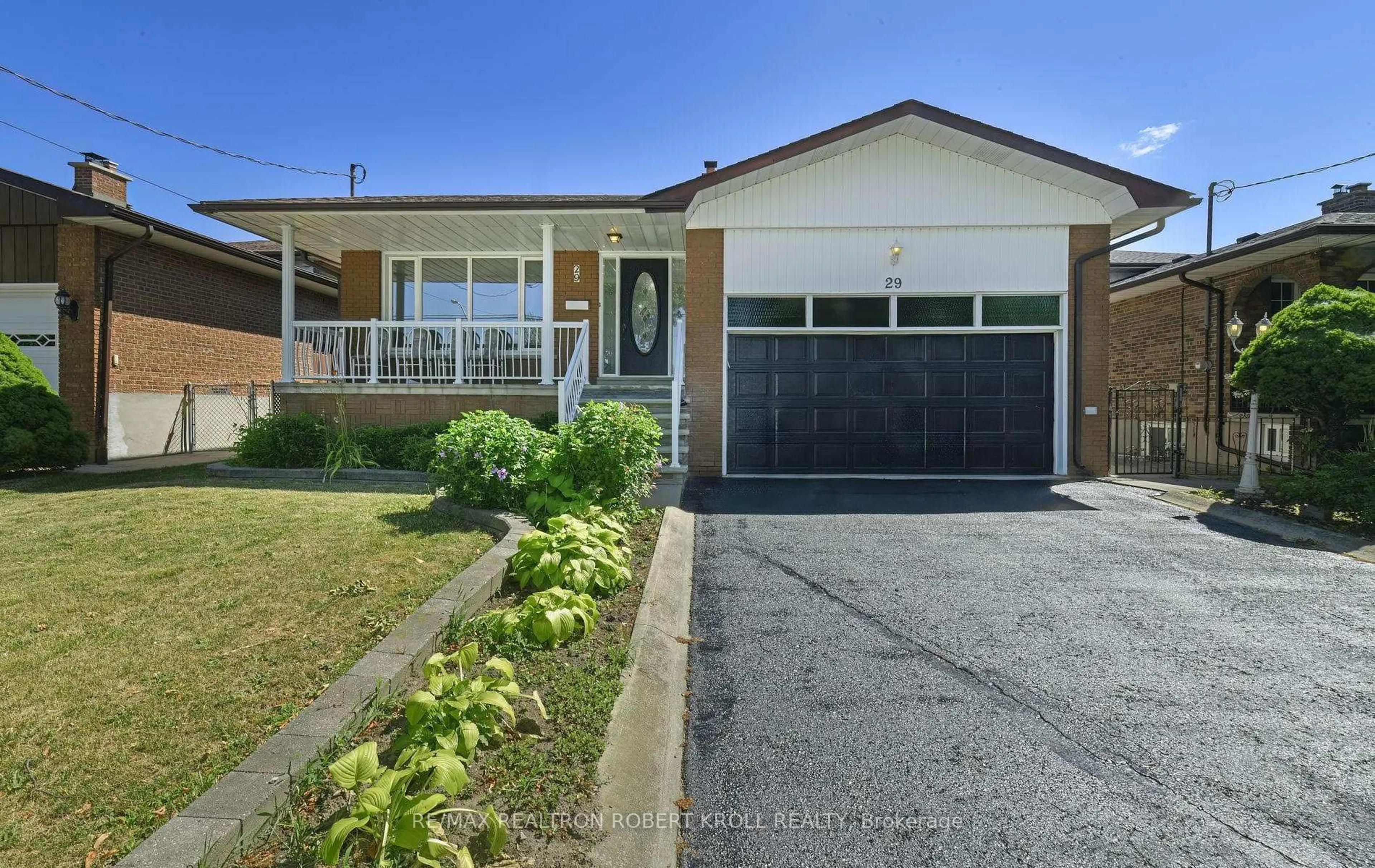Home with vinyl exterior material, street for 29 Melbert Rd, Toronto Ontario M9C 3P5