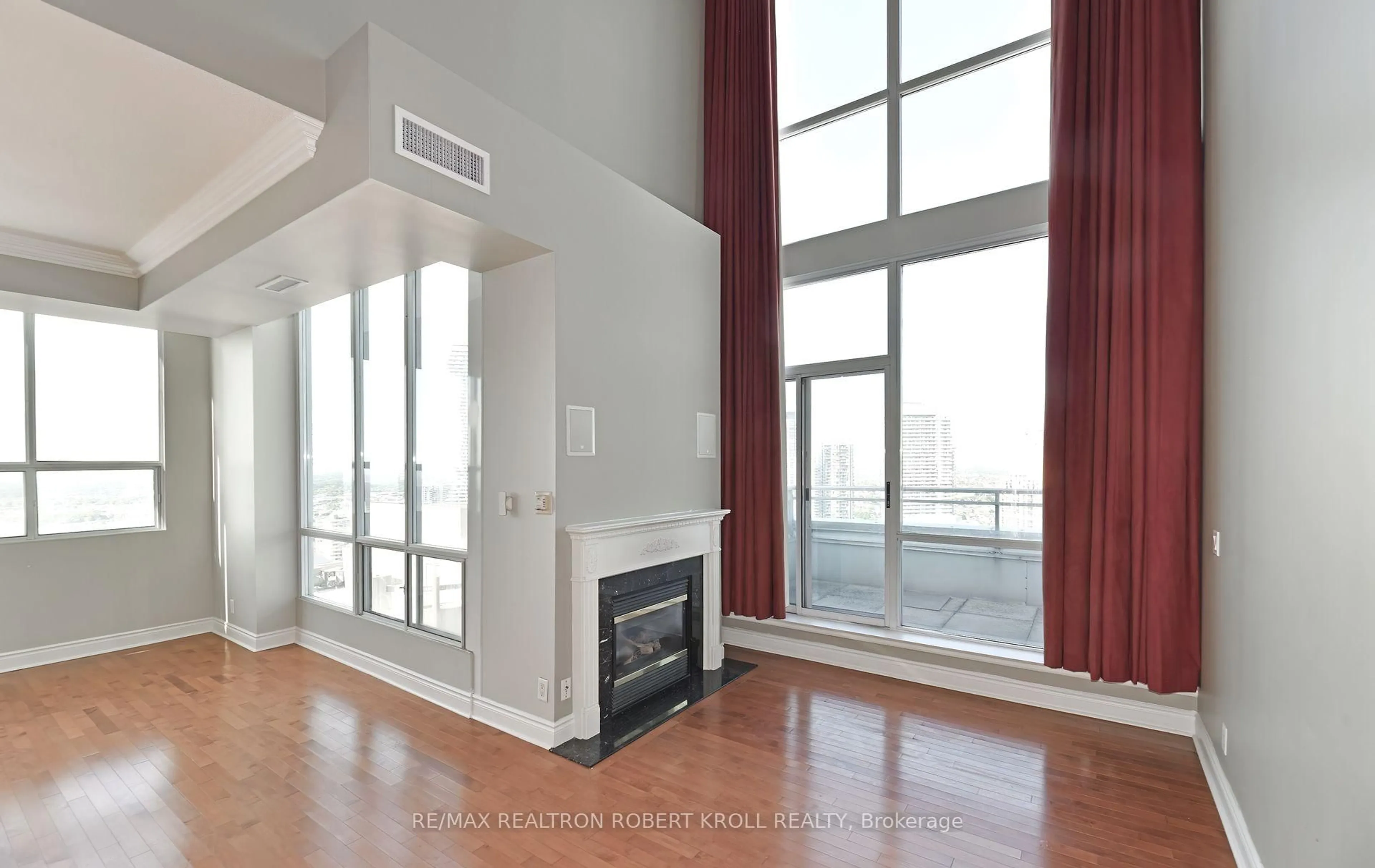 Living room with furniture, wood/laminate floor for 3939 Duke Of York Blvd #PH 7, Mississauga Ontario M5P 1B2
